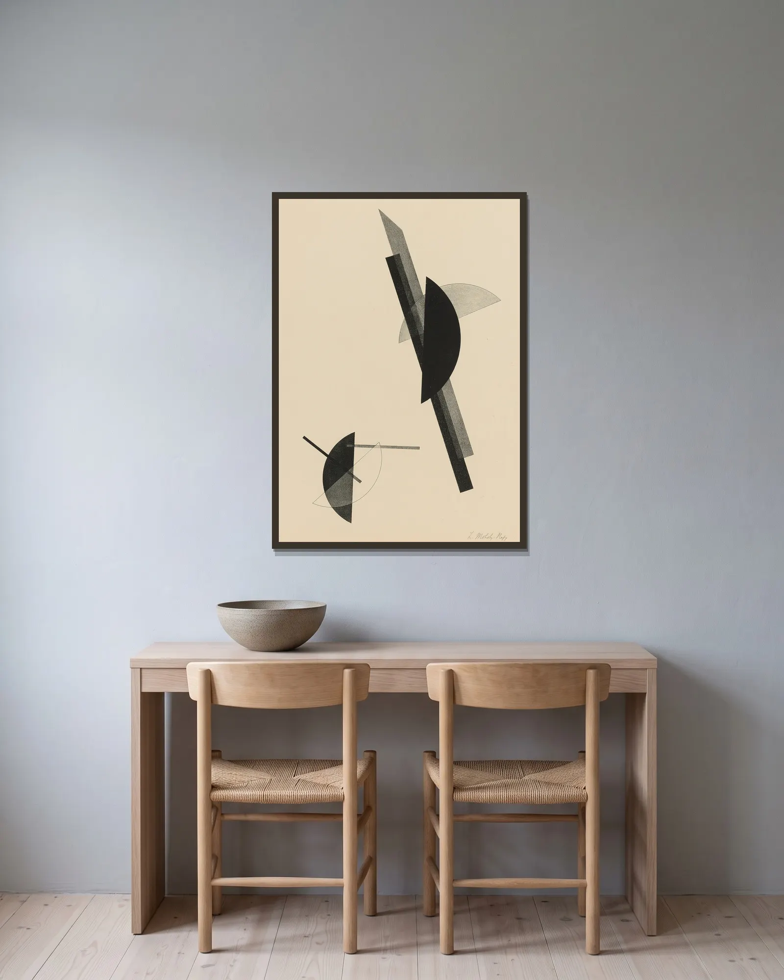 Kestnermappe; Komposition (One Plate) (Passuth 125) av László Moholy-Nagy inramad på en vägg