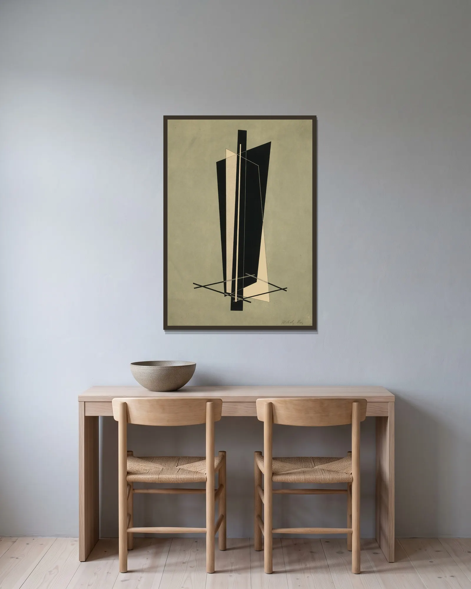 Kestnermappe; Komposition (One Plate) (P. 123) av László Moholy-Nagy inramad på en vägg
