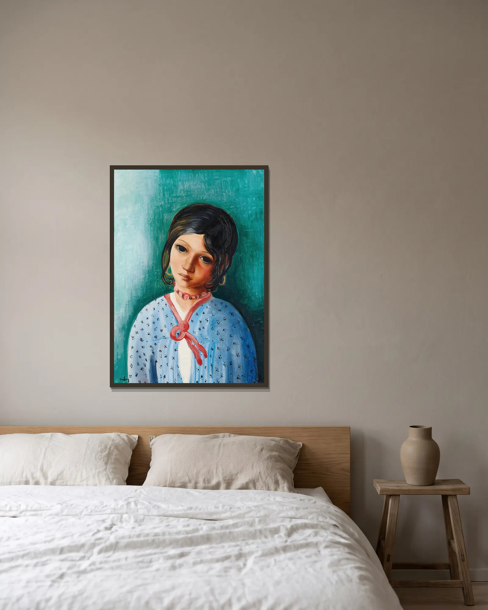 Portrait d’une enfant av Moïse Kisling inramad på en vägg