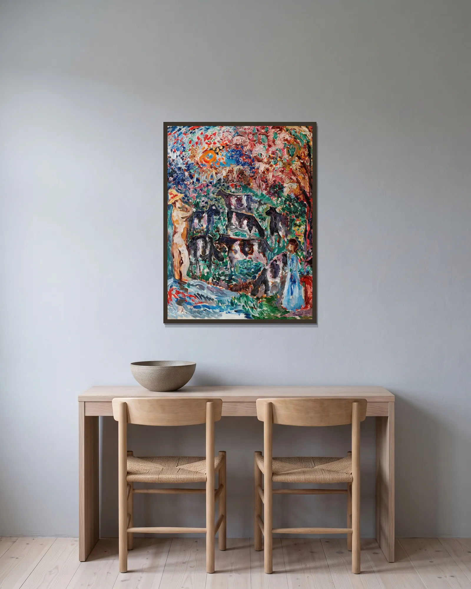 Koherde av Nils Dardel inramad på en vägg