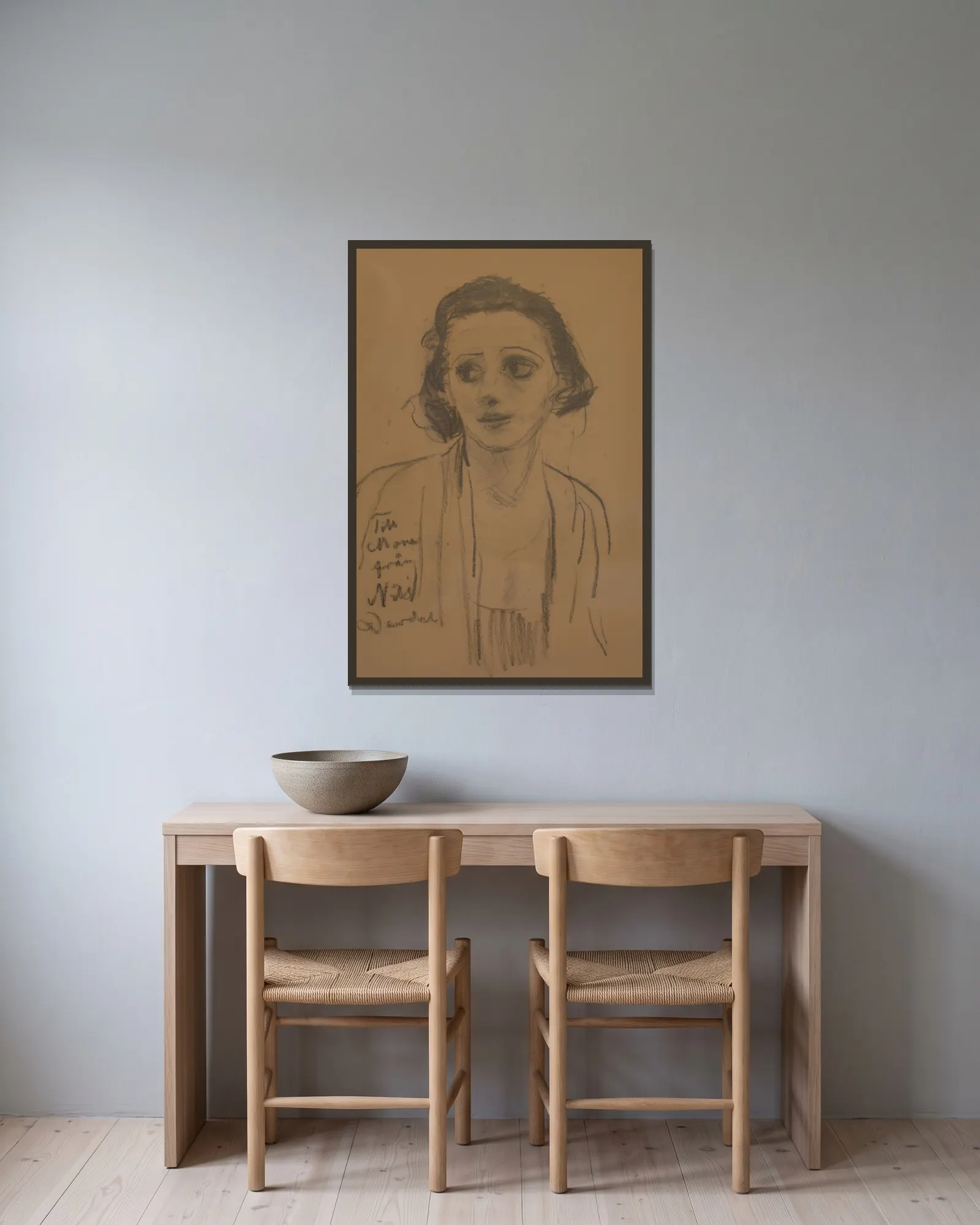 Mona Mårtensson av Nils Dardel inramad på en vägg