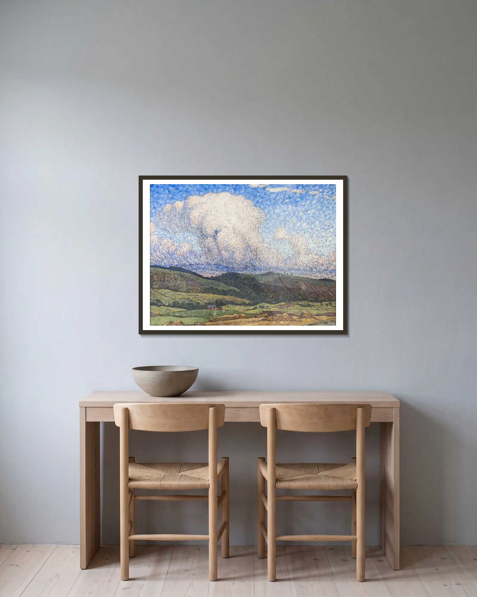 Sunlit Clouds av Nils Kreuger inramad på en vägg