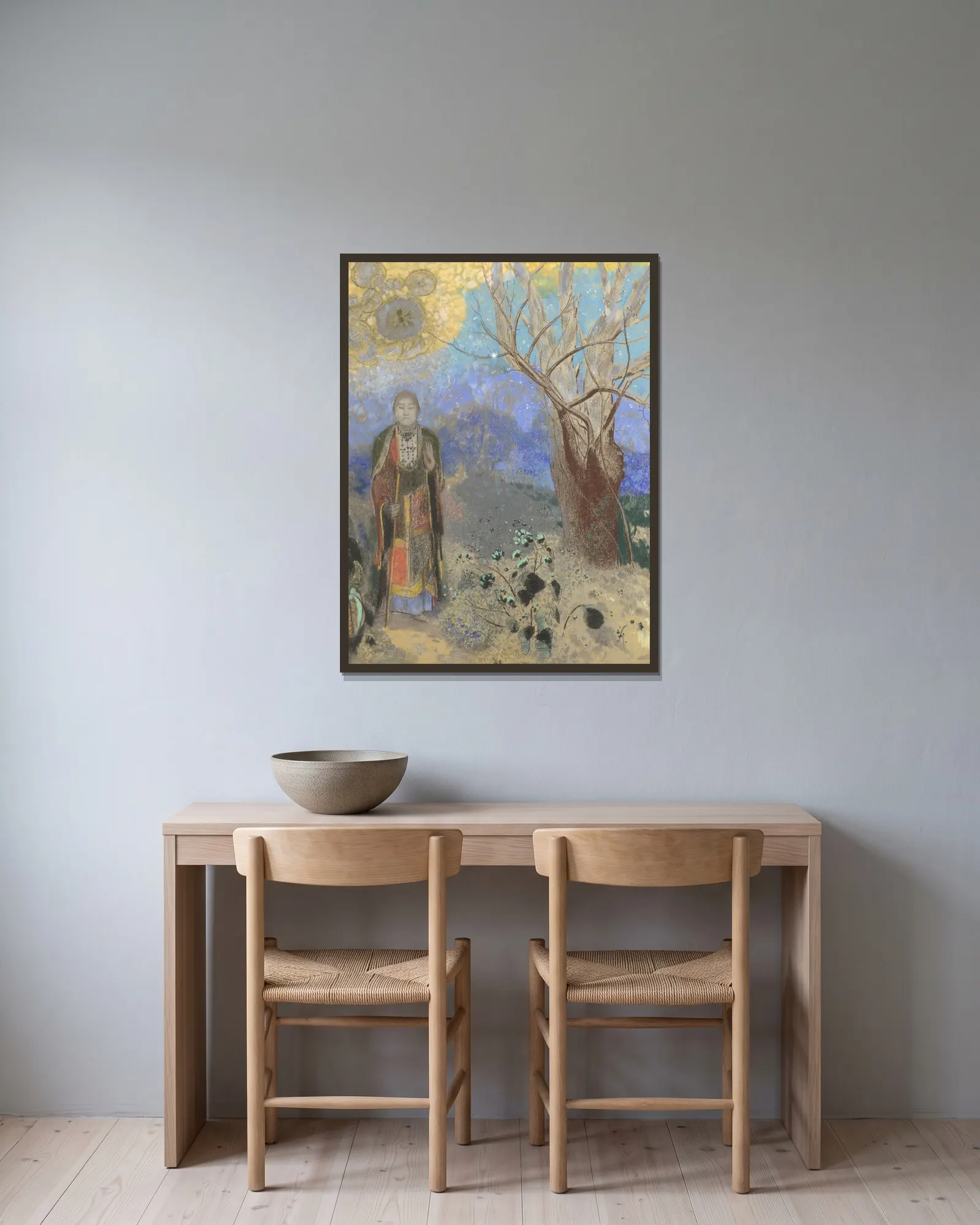 Buddha av Odilon Redon inramad på en vägg