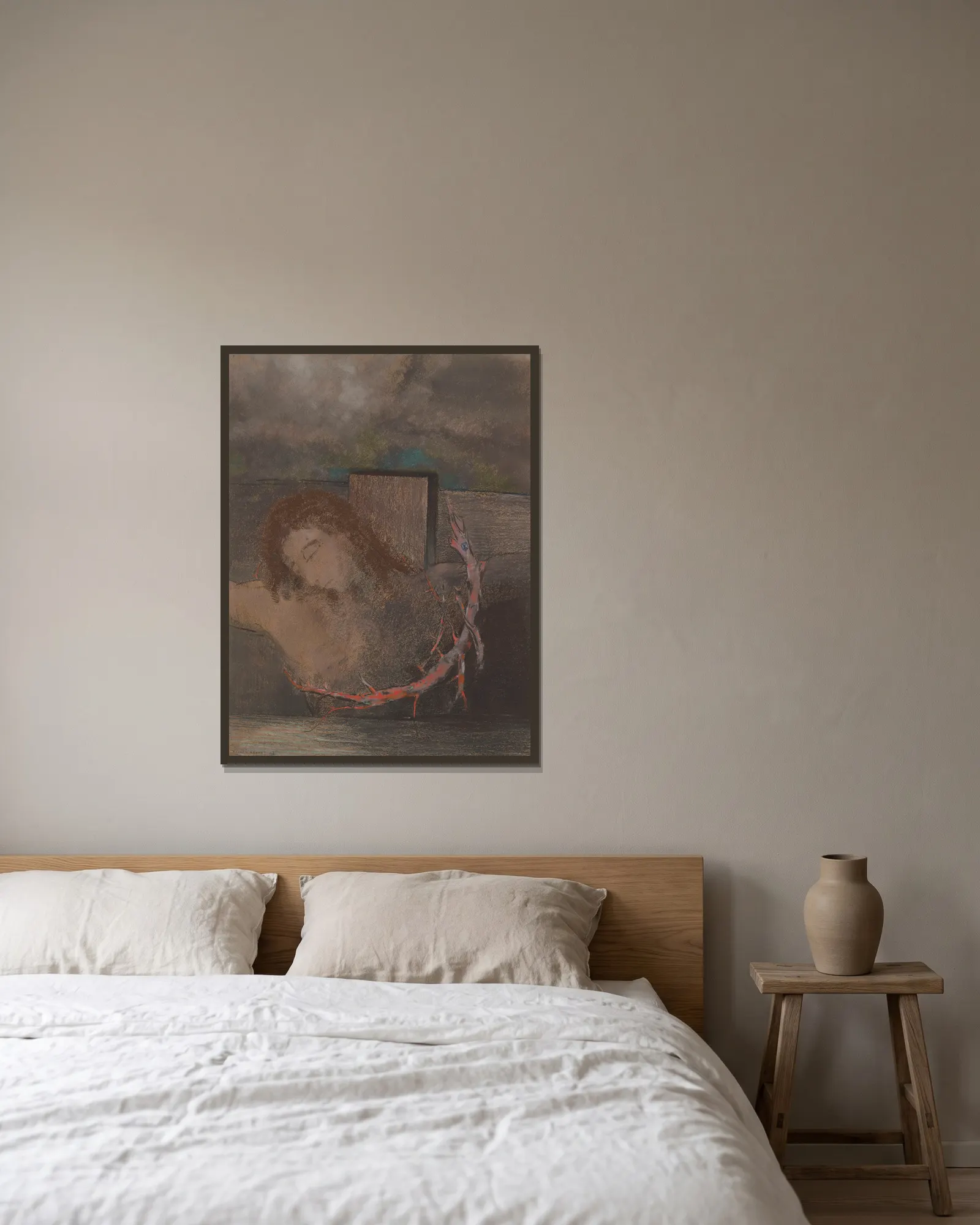 Christ Crucified av Odilon Redon inramad på en vägg