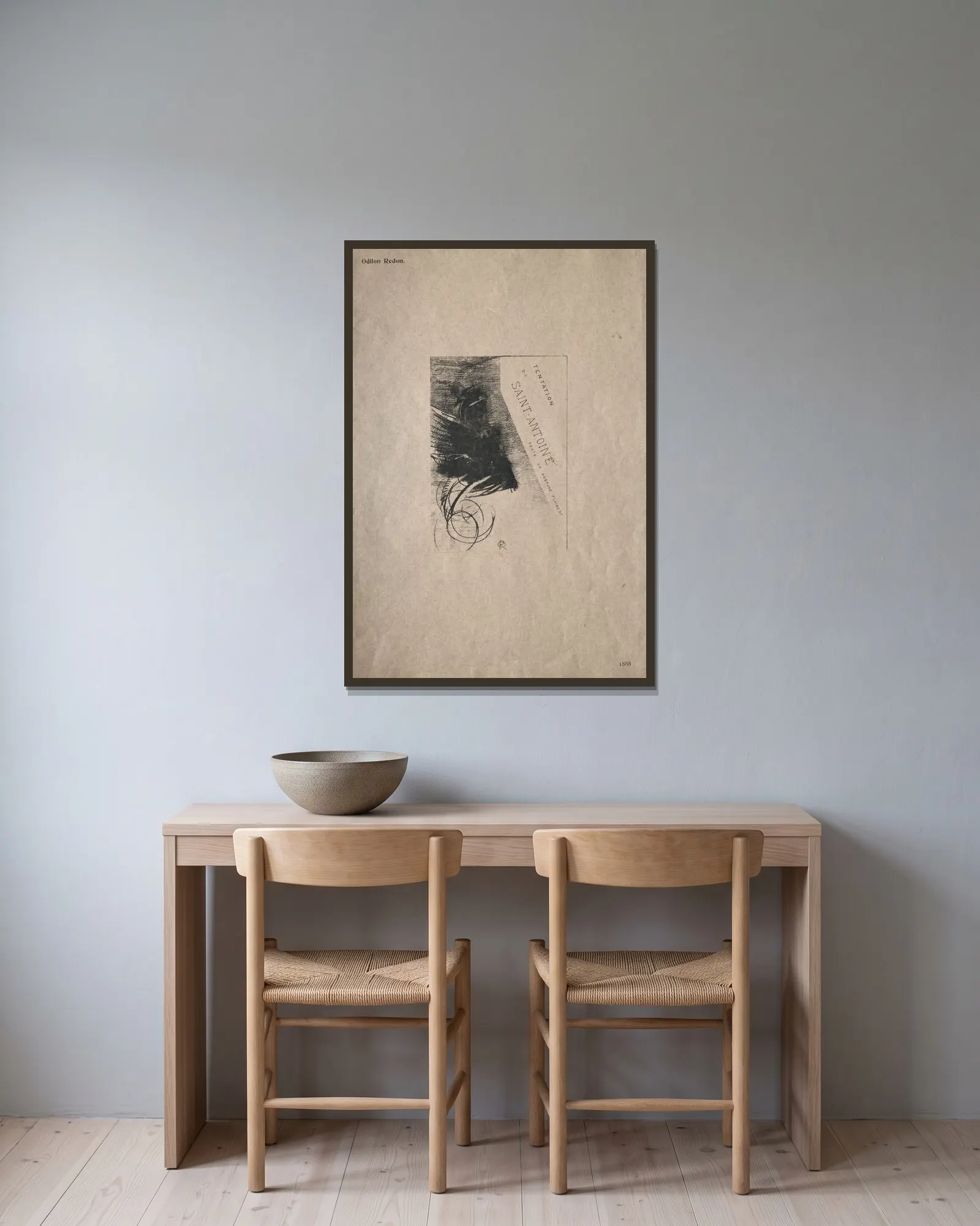 Cover av Odilon Redon inramad på en vägg