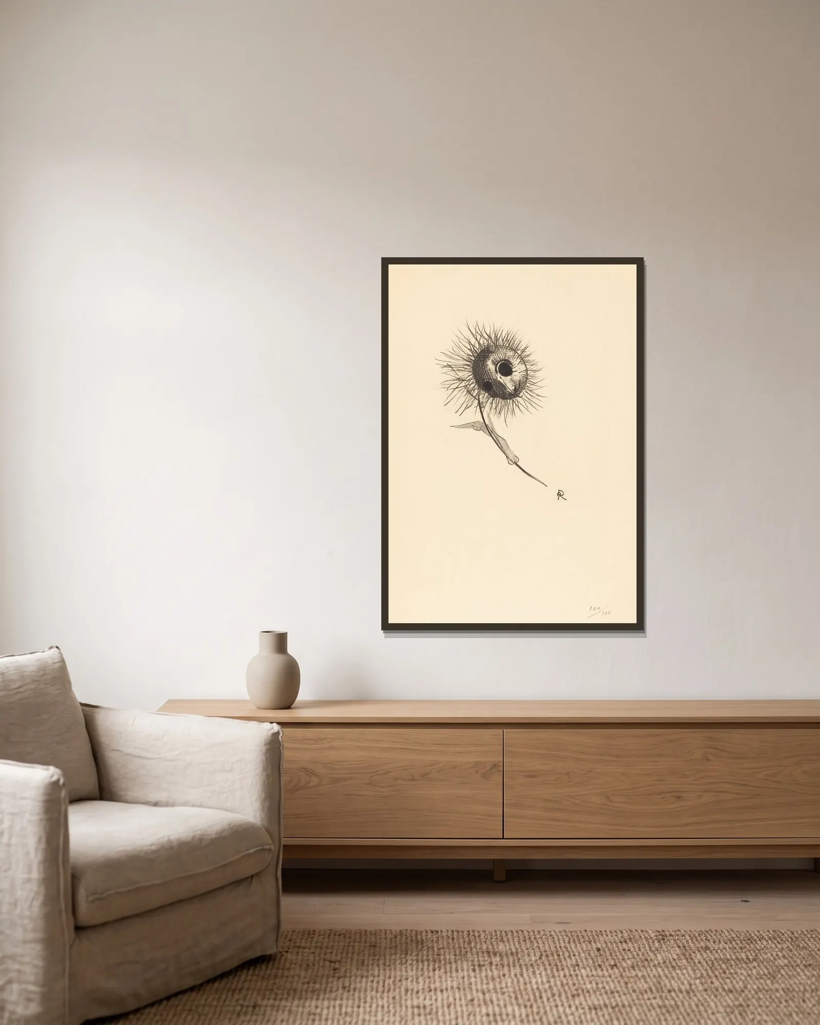 Cul-de-Lampe av Odilon Redon inramad på en vägg