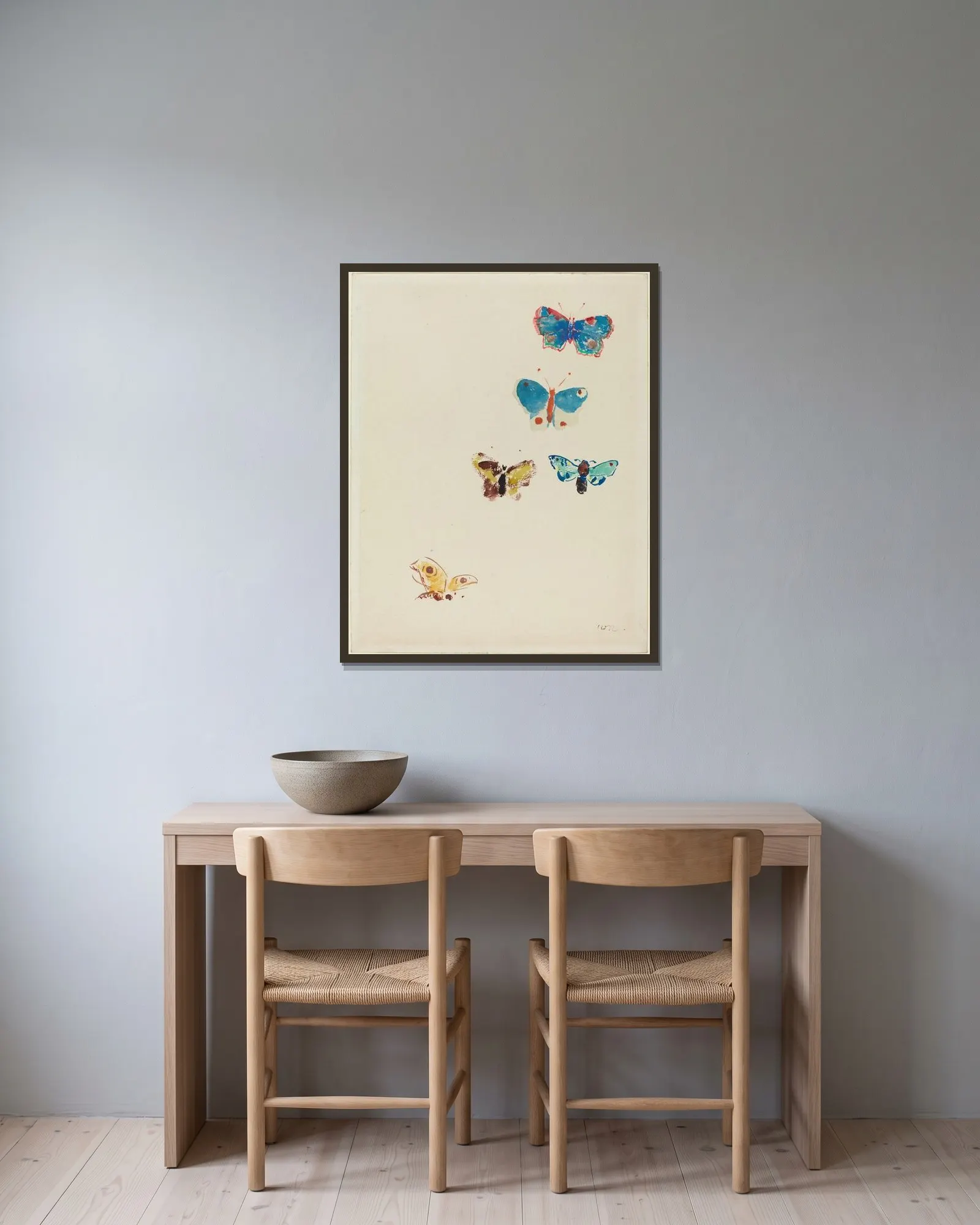 Five Butterflies av Odilon Redon inramad på en vägg