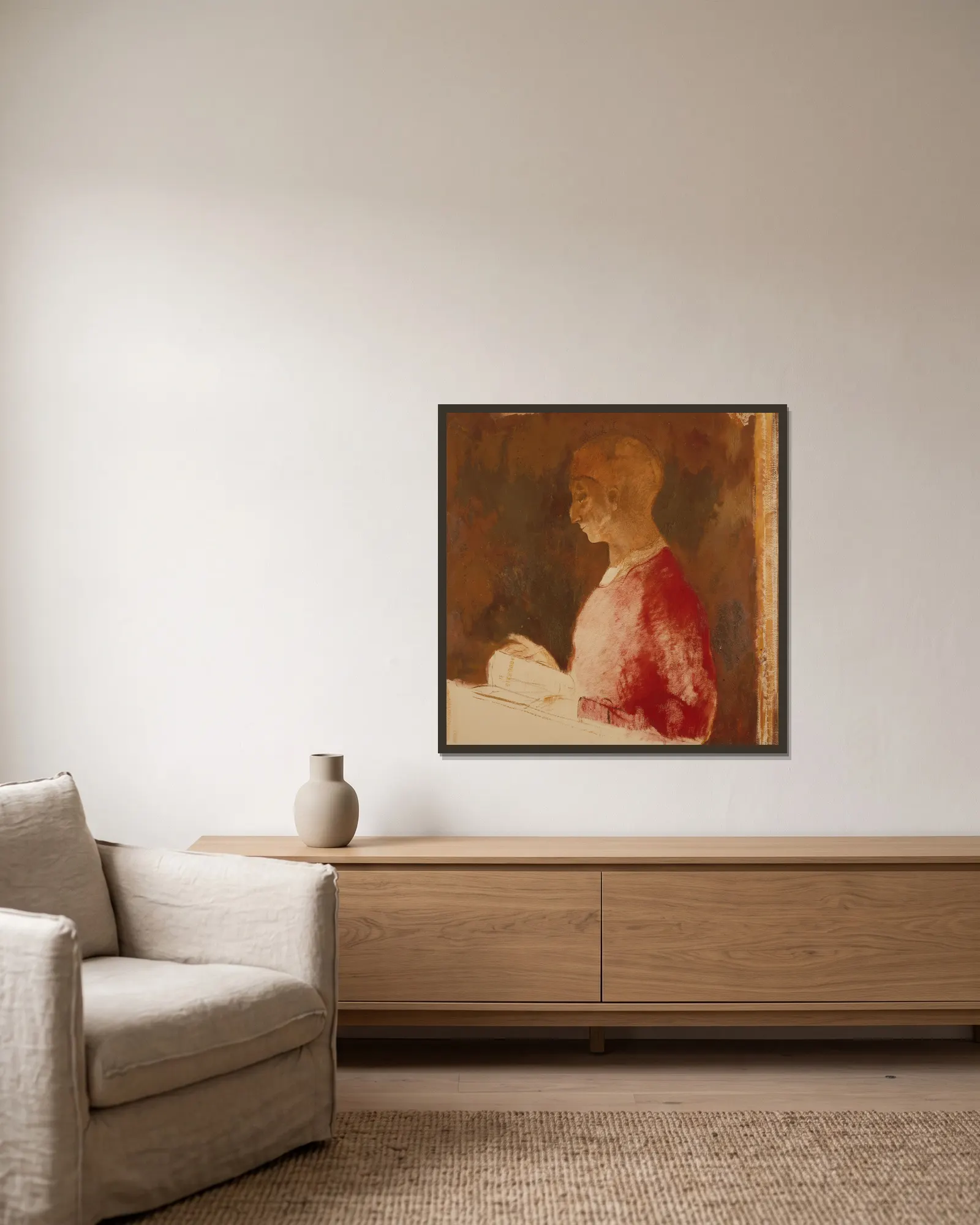 Le Graveur av Odilon Redon inramad på en vägg
