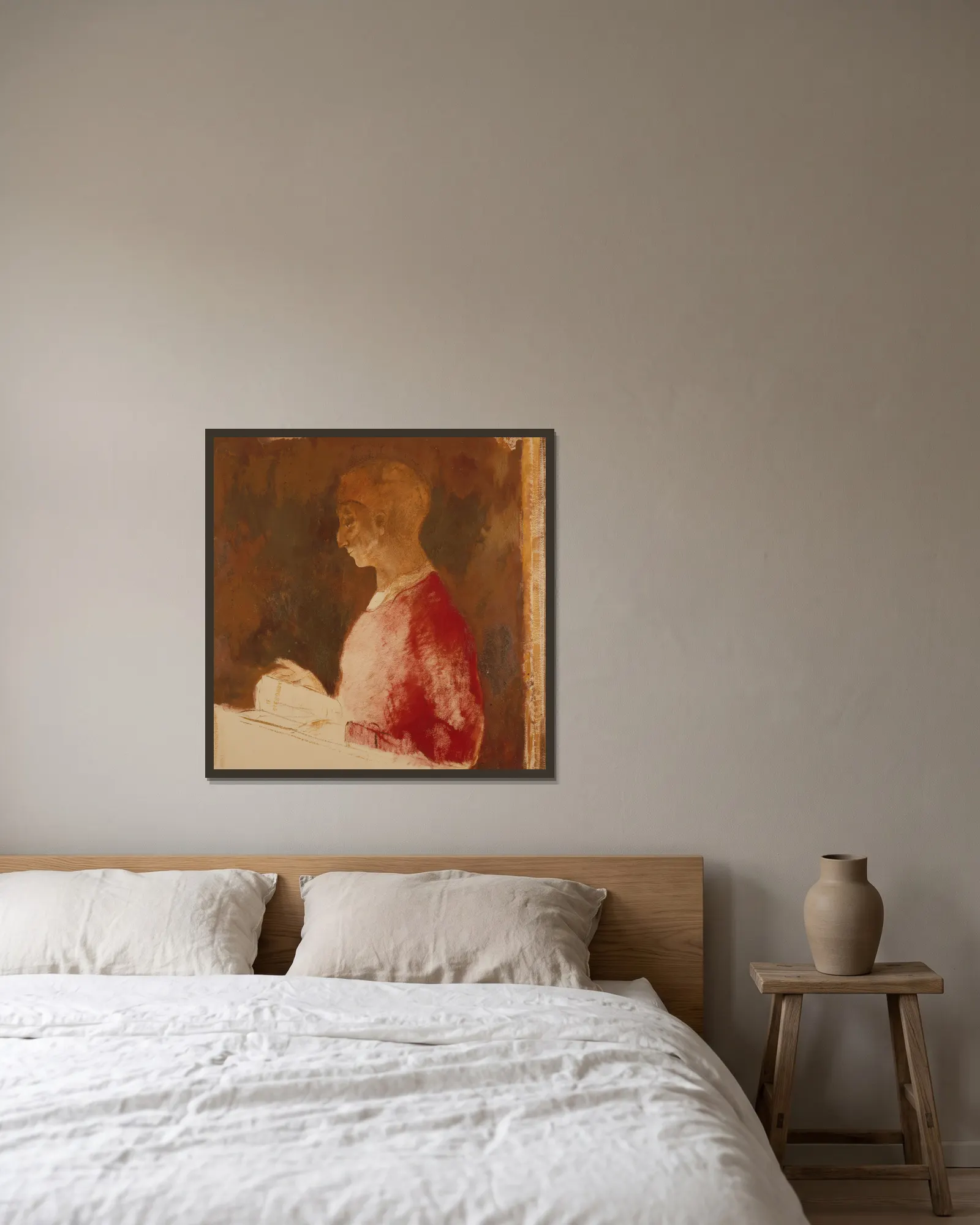 Le Graveur av Odilon Redon inramad på en vägg