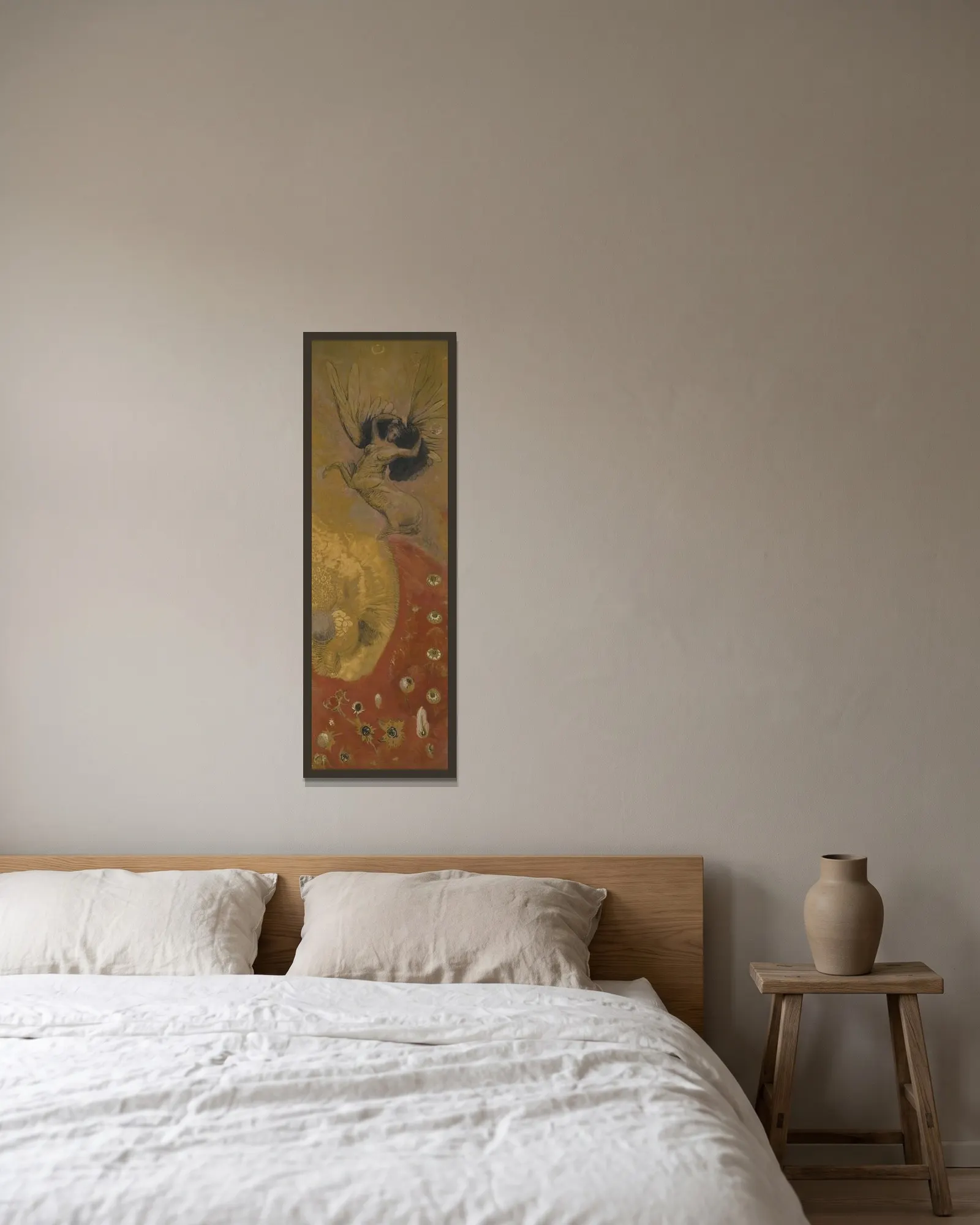 Le monde des chimères av Odilon Redon inramad på en vägg