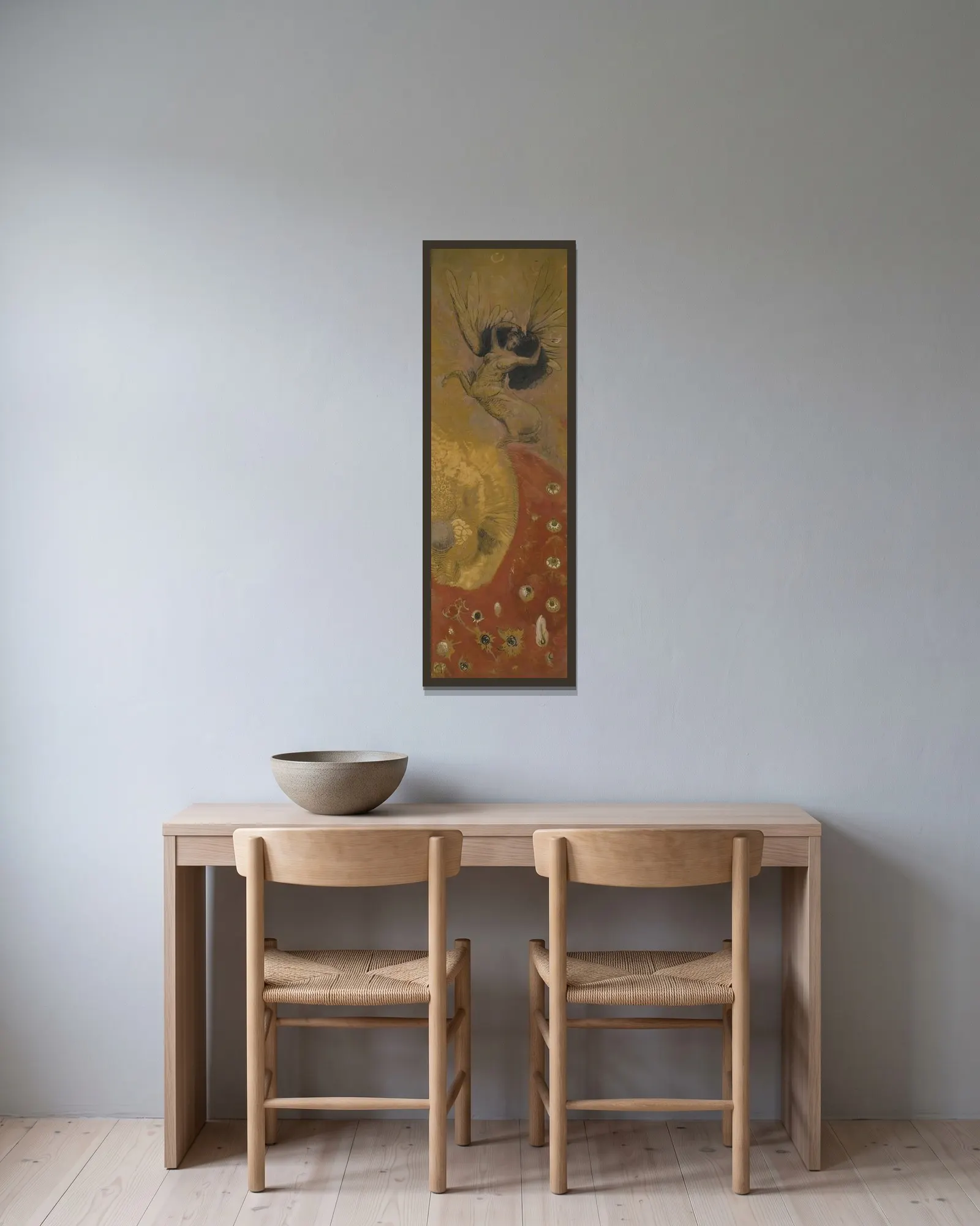 Le monde des chimères av Odilon Redon inramad på en vägg