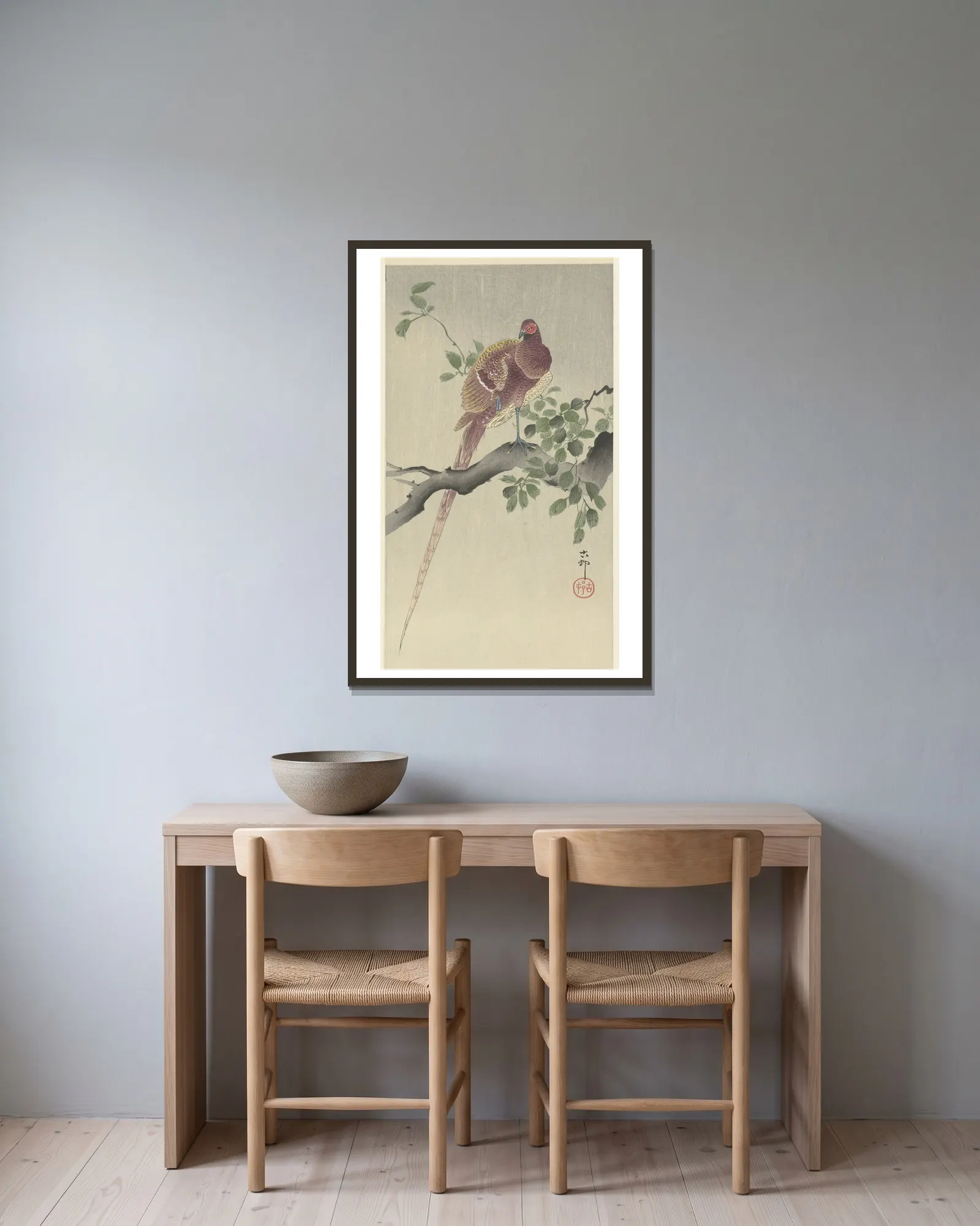 Copper pheasant av Ohara Koson inramad på en vägg
