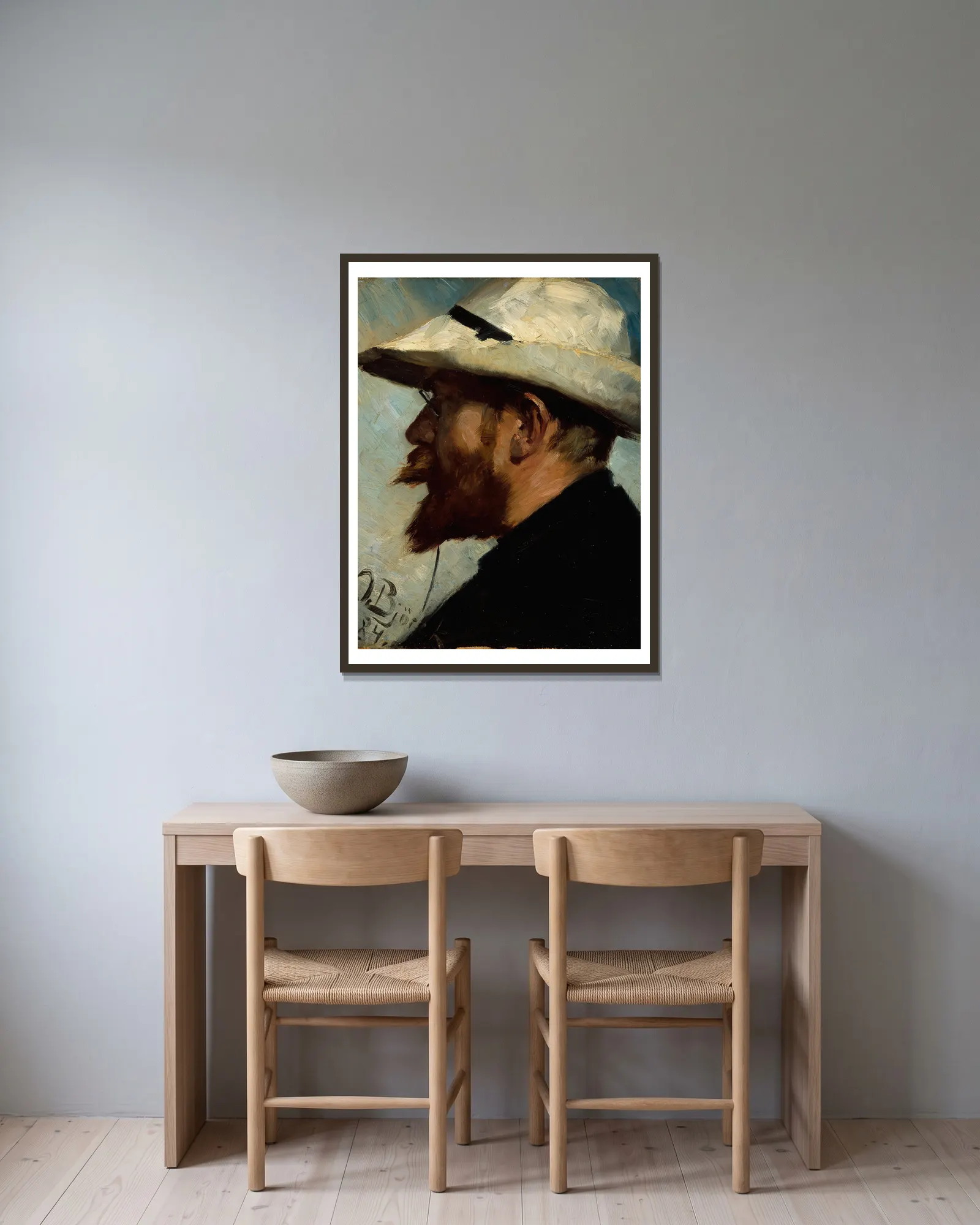 Porträtt av P.S. Krøyer av Oscar Björck inramad på en vägg