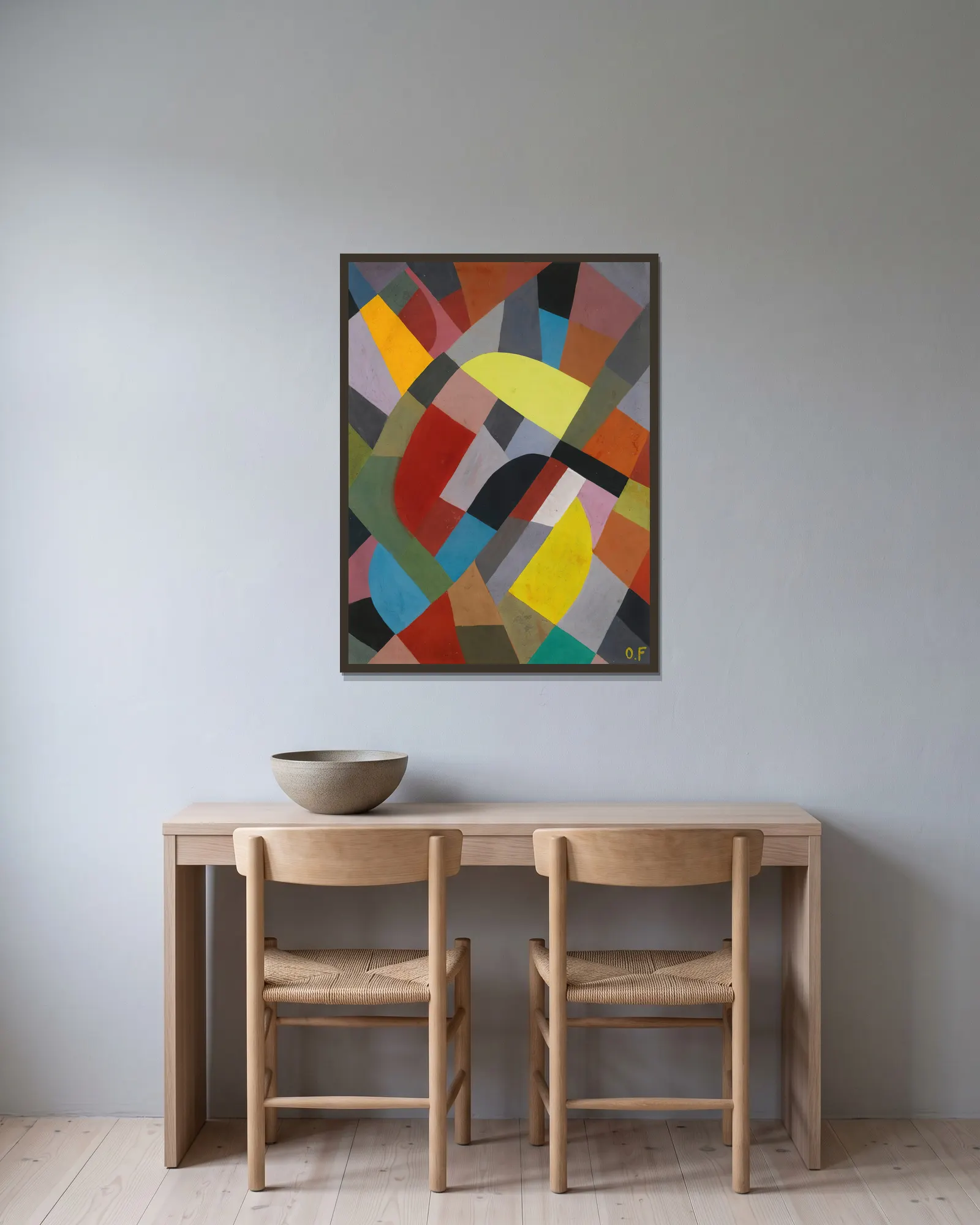 Composition Abstraite av Otto Freundlich inramad på en vägg