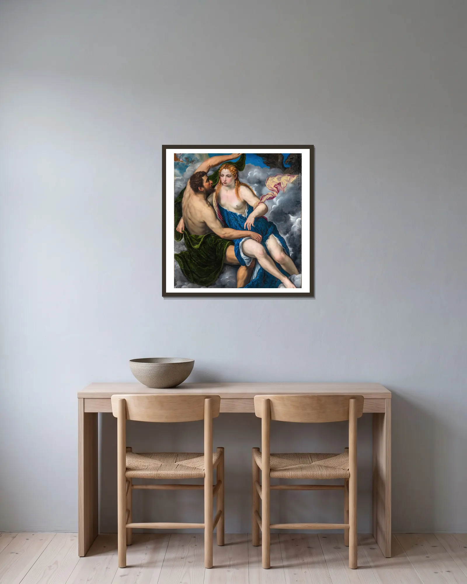 Jupiter and Io av Paris Bordone inramad på en vägg