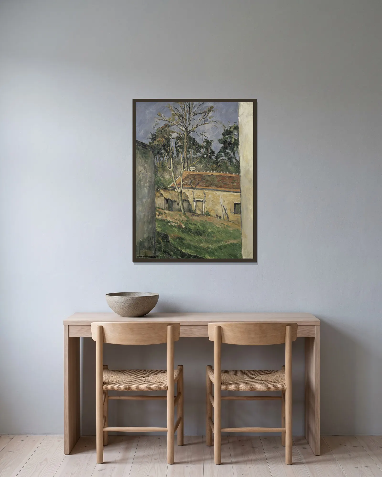 Farmyard av Paul Cézanne inramad på en vägg