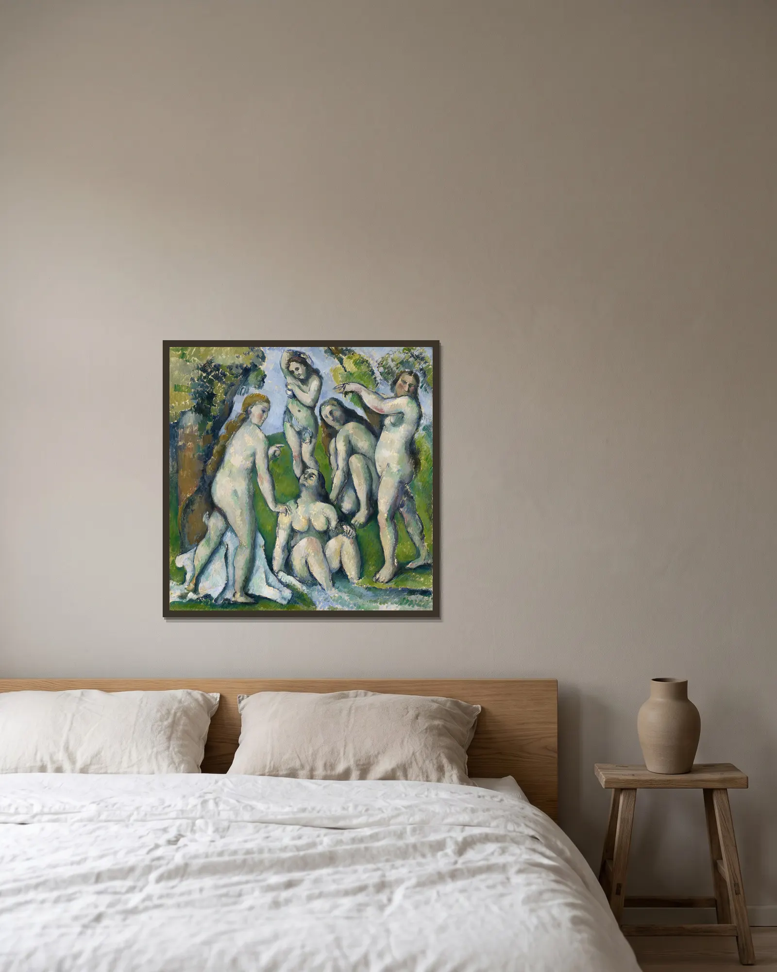 Five Bathers av Paul Cézanne inramad på en vägg