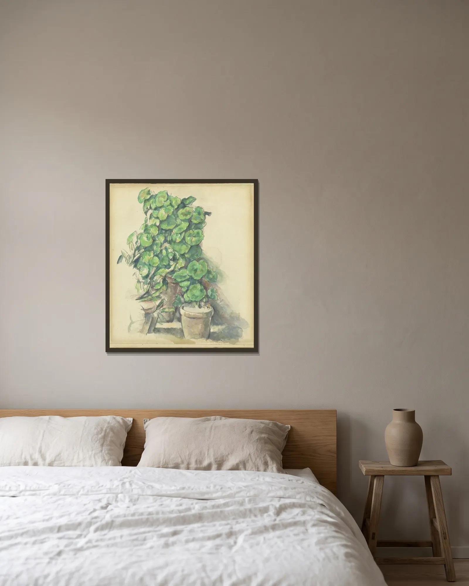 Geraniums av Paul Cézanne inramad på en vägg