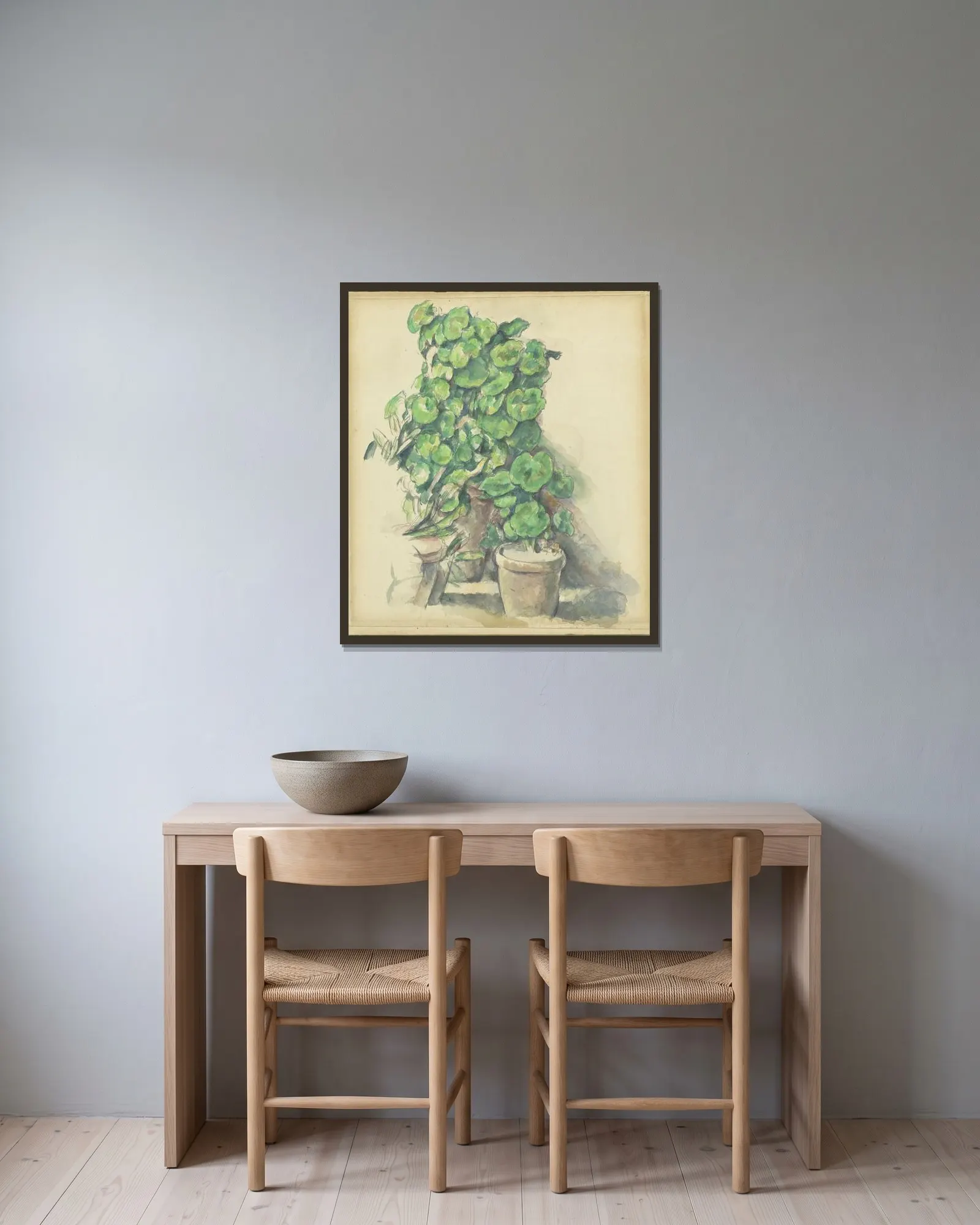 Geraniums av Paul Cézanne inramad på en vägg