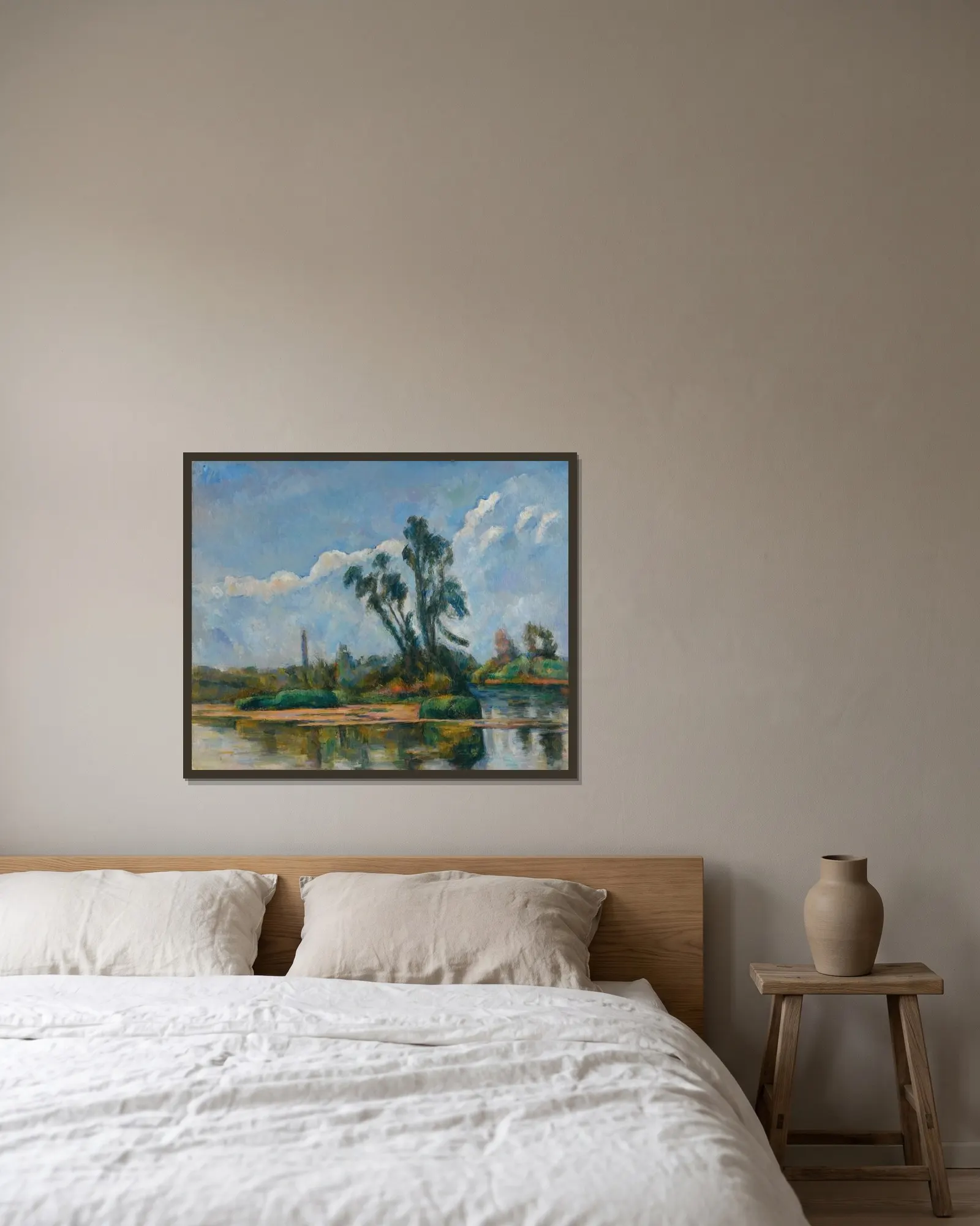 La Rivière av Paul Cézanne inramad på en vägg