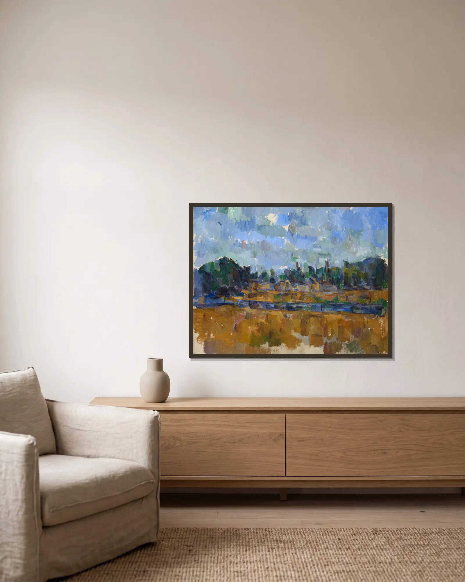 Riverside av Paul Cézanne inramad på en vägg