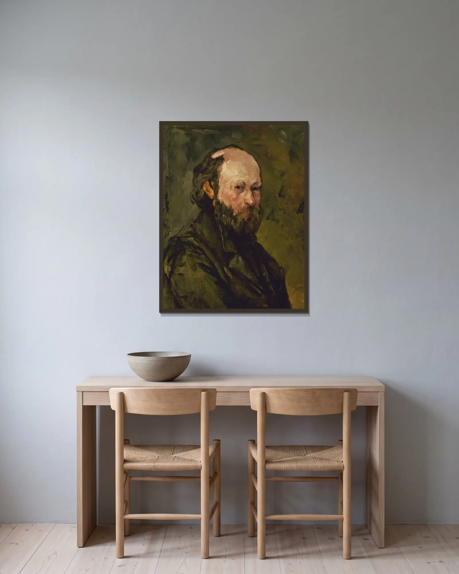 Self-Portrait av Paul Cézanne inramad på en vägg