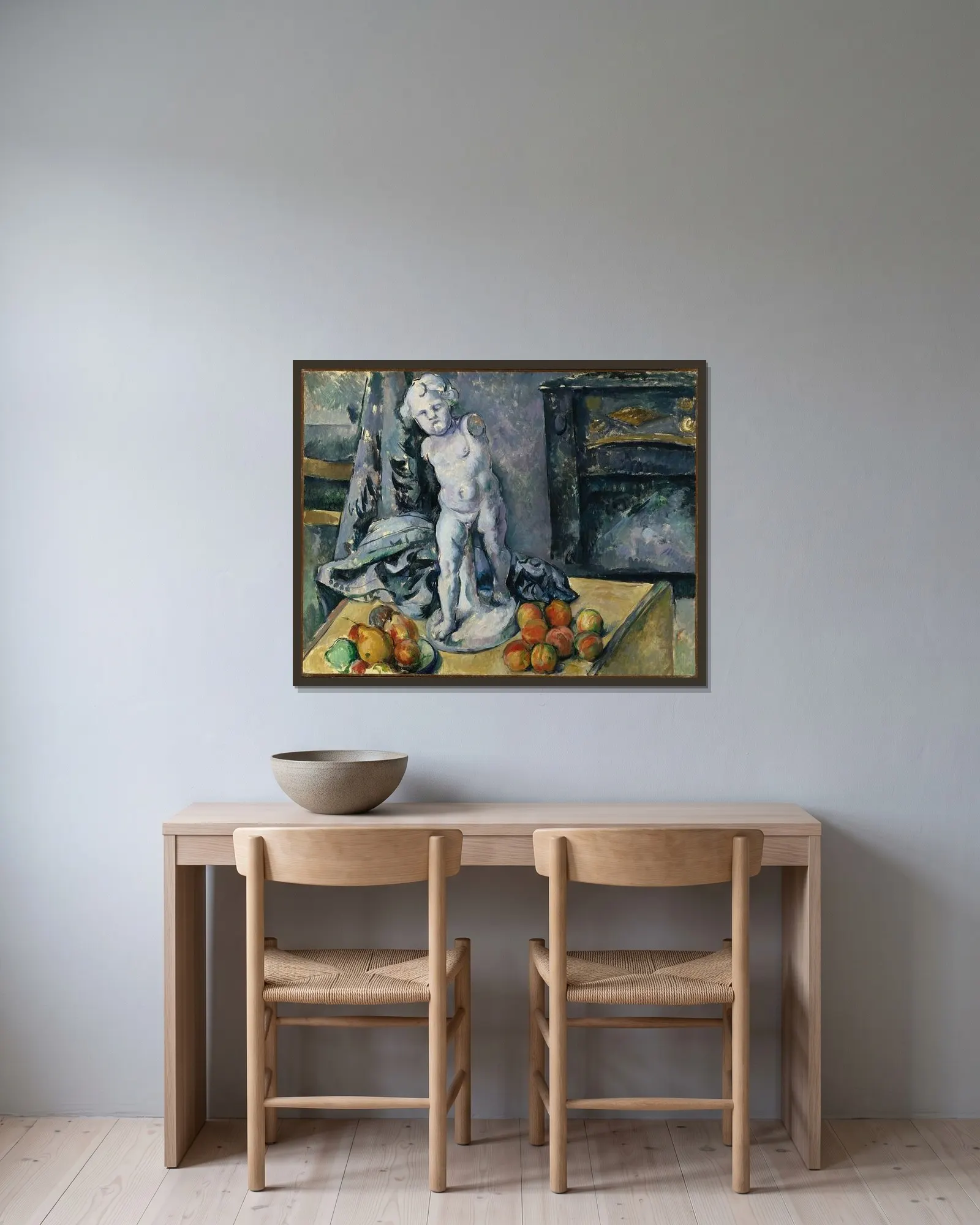 Still Life with Statuette av Paul Cézanne inramad på en vägg
