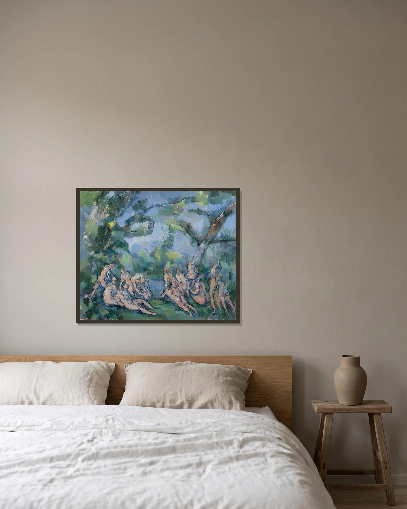 The Bathers av Paul Cézanne inramad på en vägg