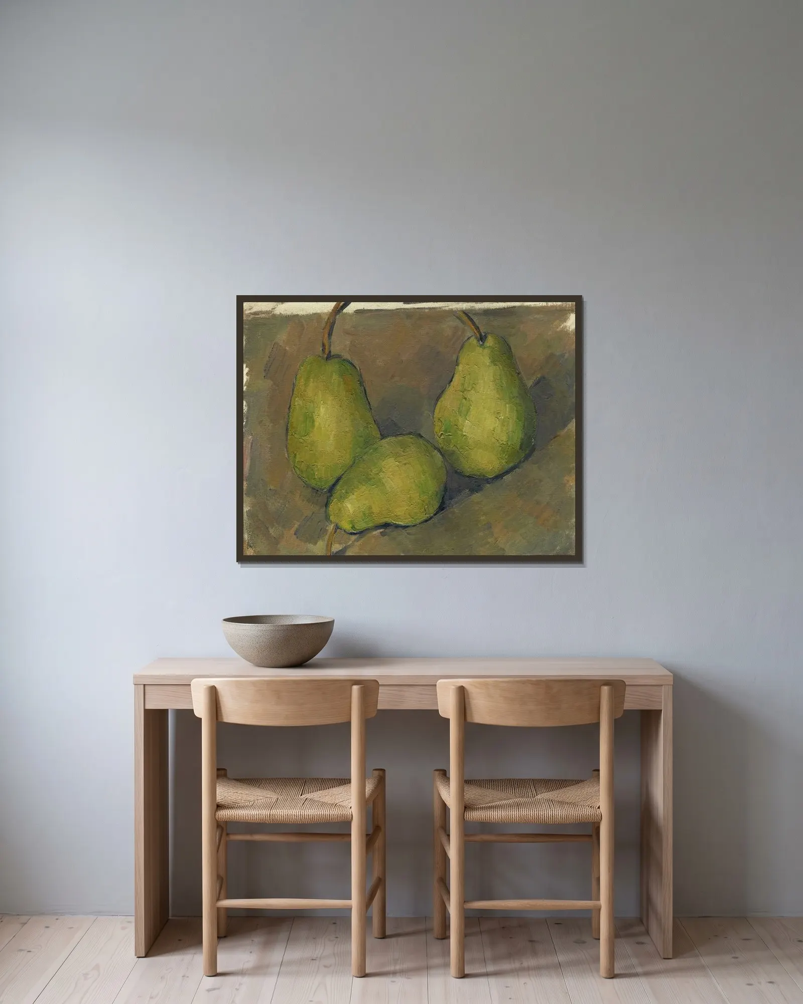 Three Pears av Paul Cézanne inramad på en vägg