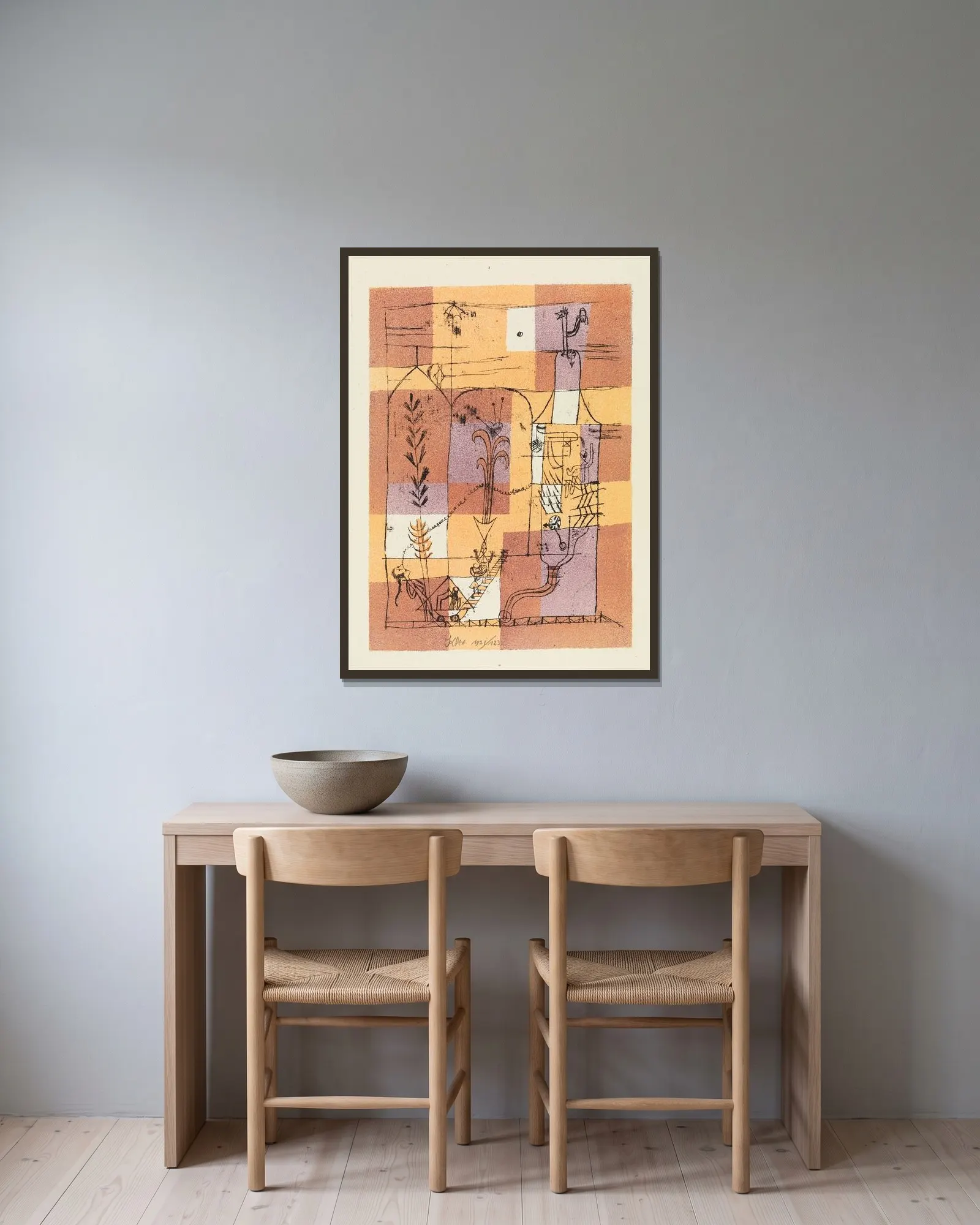 Hoffmanneske Szene av Paul Klee inramad på en vägg