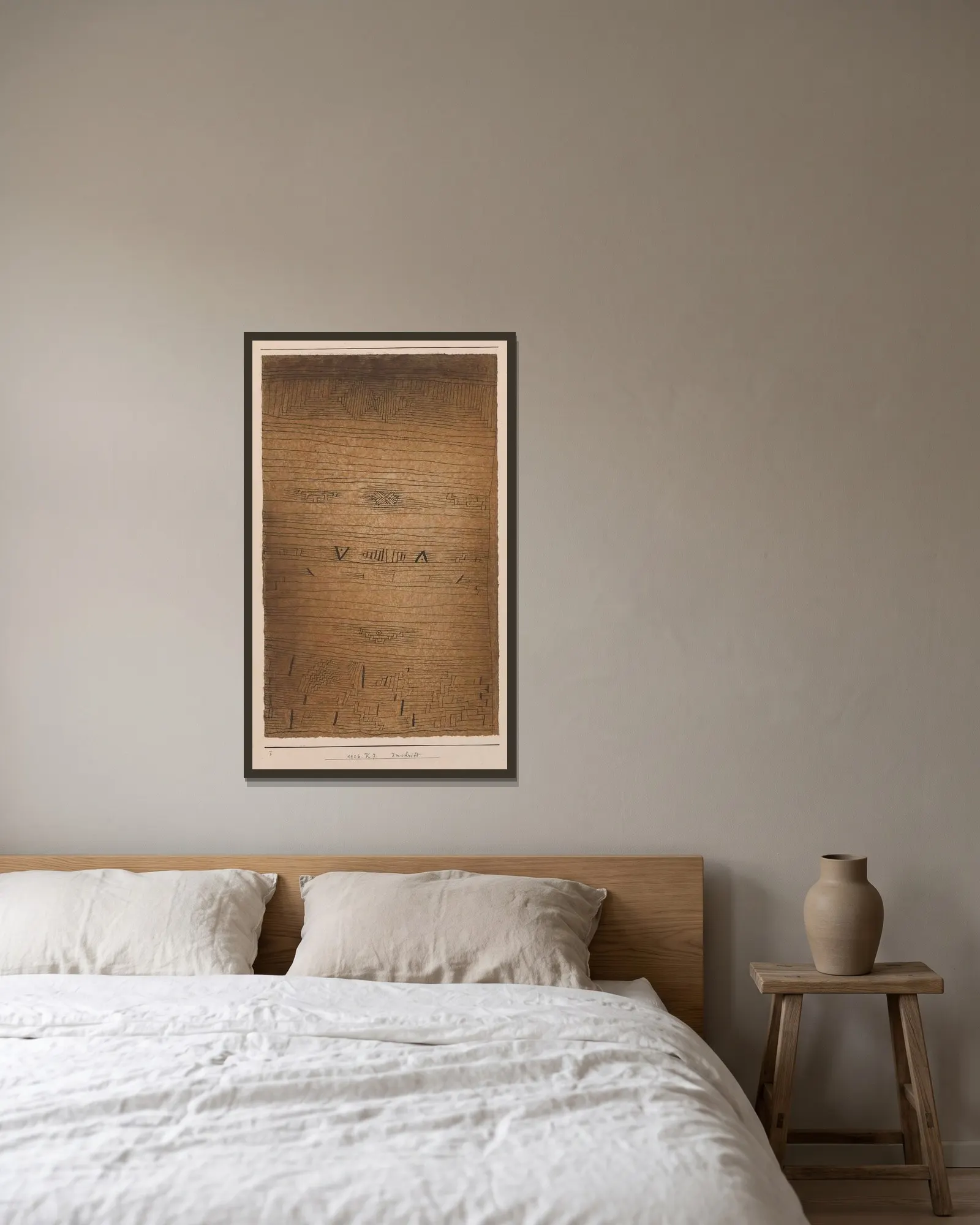 Inscription av Paul Klee inramad på en vägg