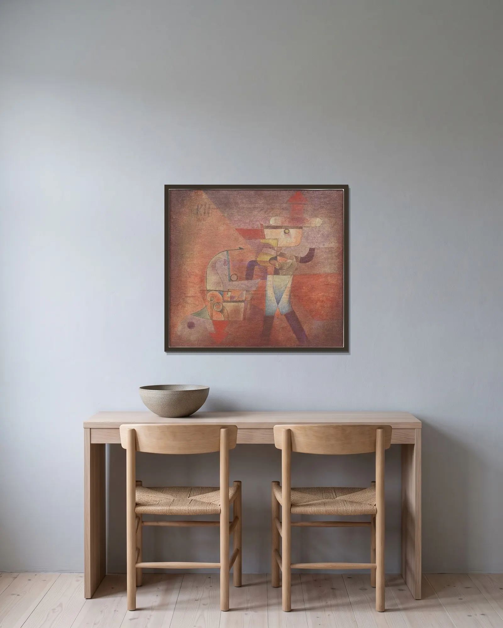 KN der Schmied av Paul Klee inramad på en vägg
