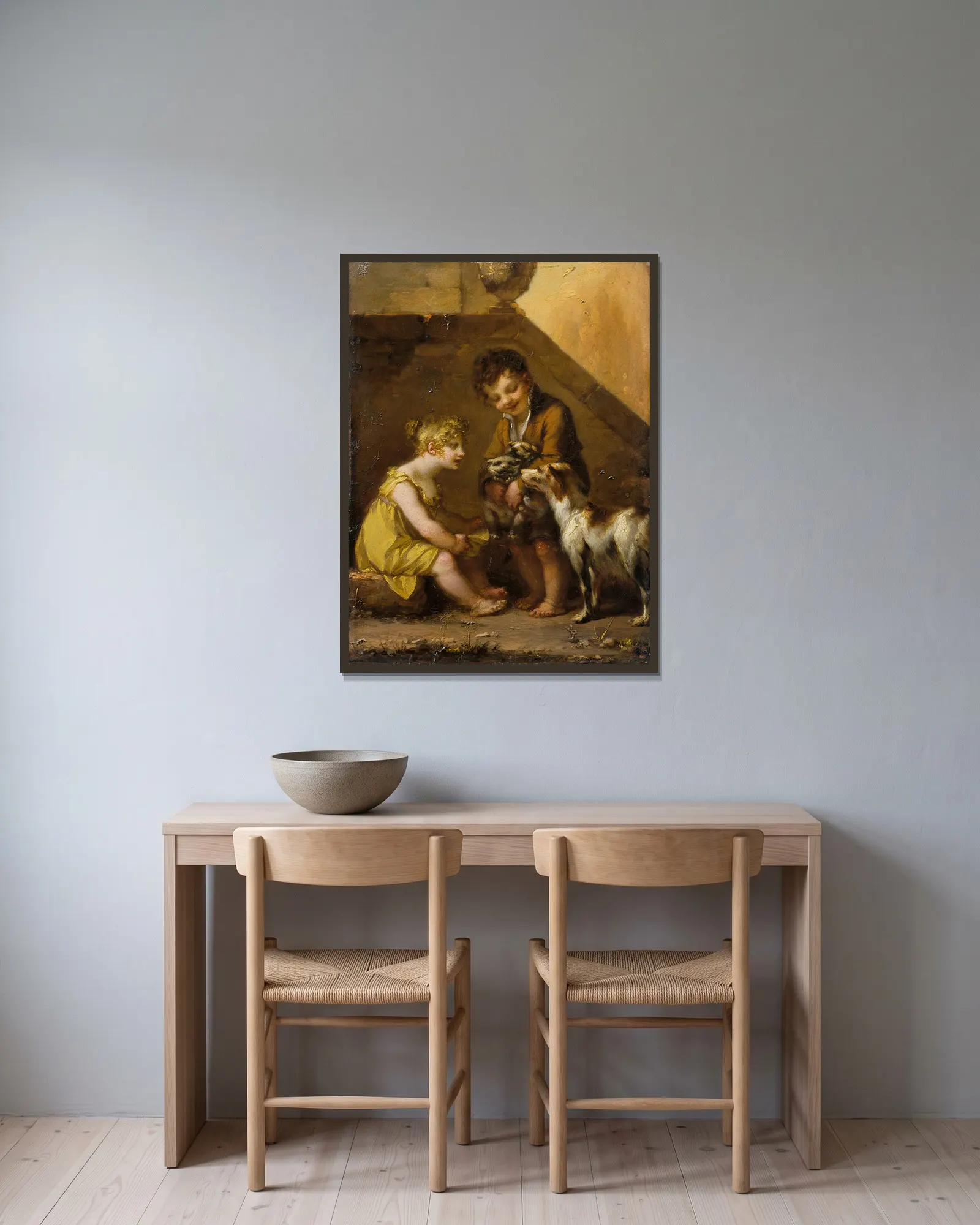 Puppies av Pierre-Paul Prud'hon inramad på en vägg