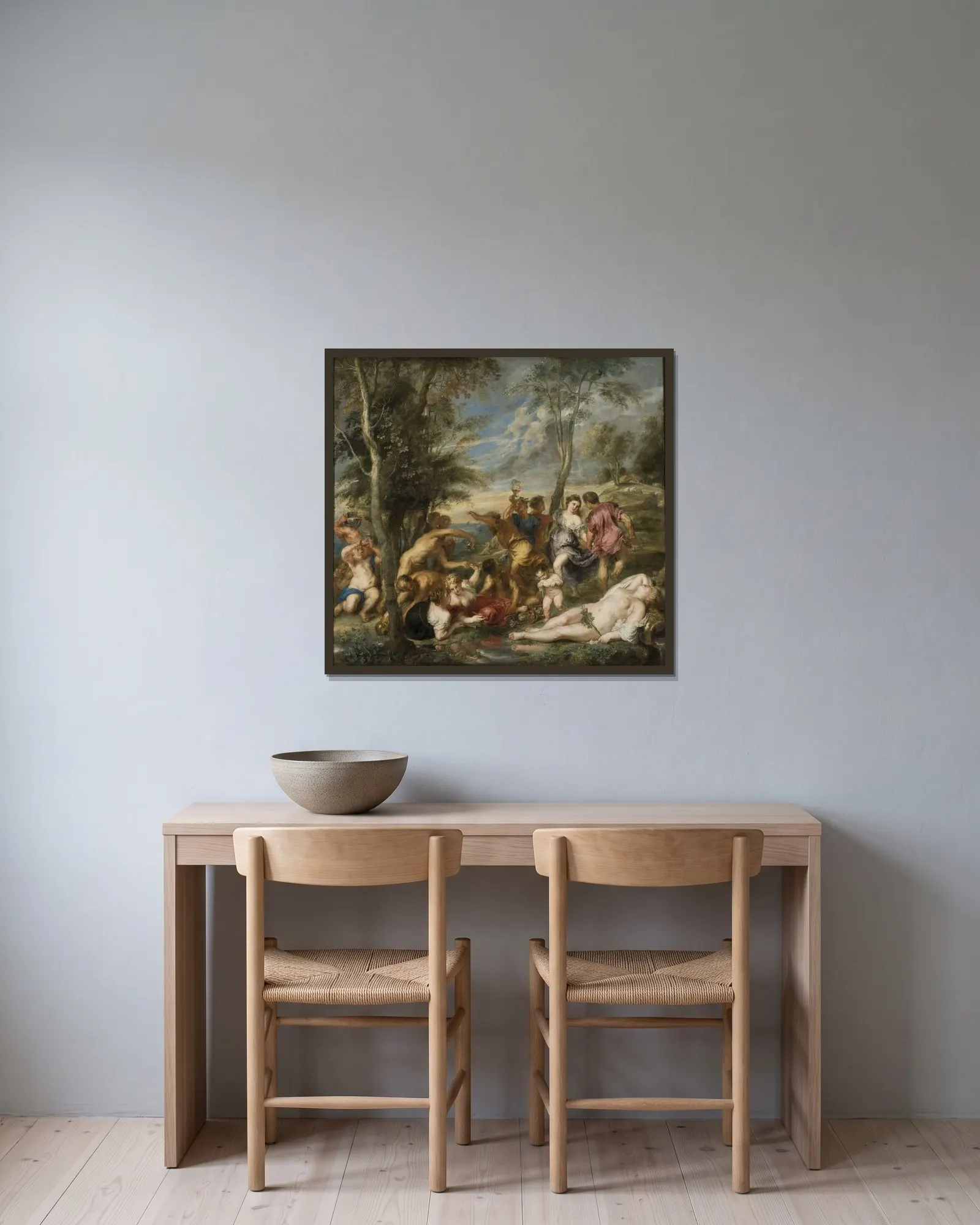 The Andrians av Peter Paul Rubens inramad på en vägg