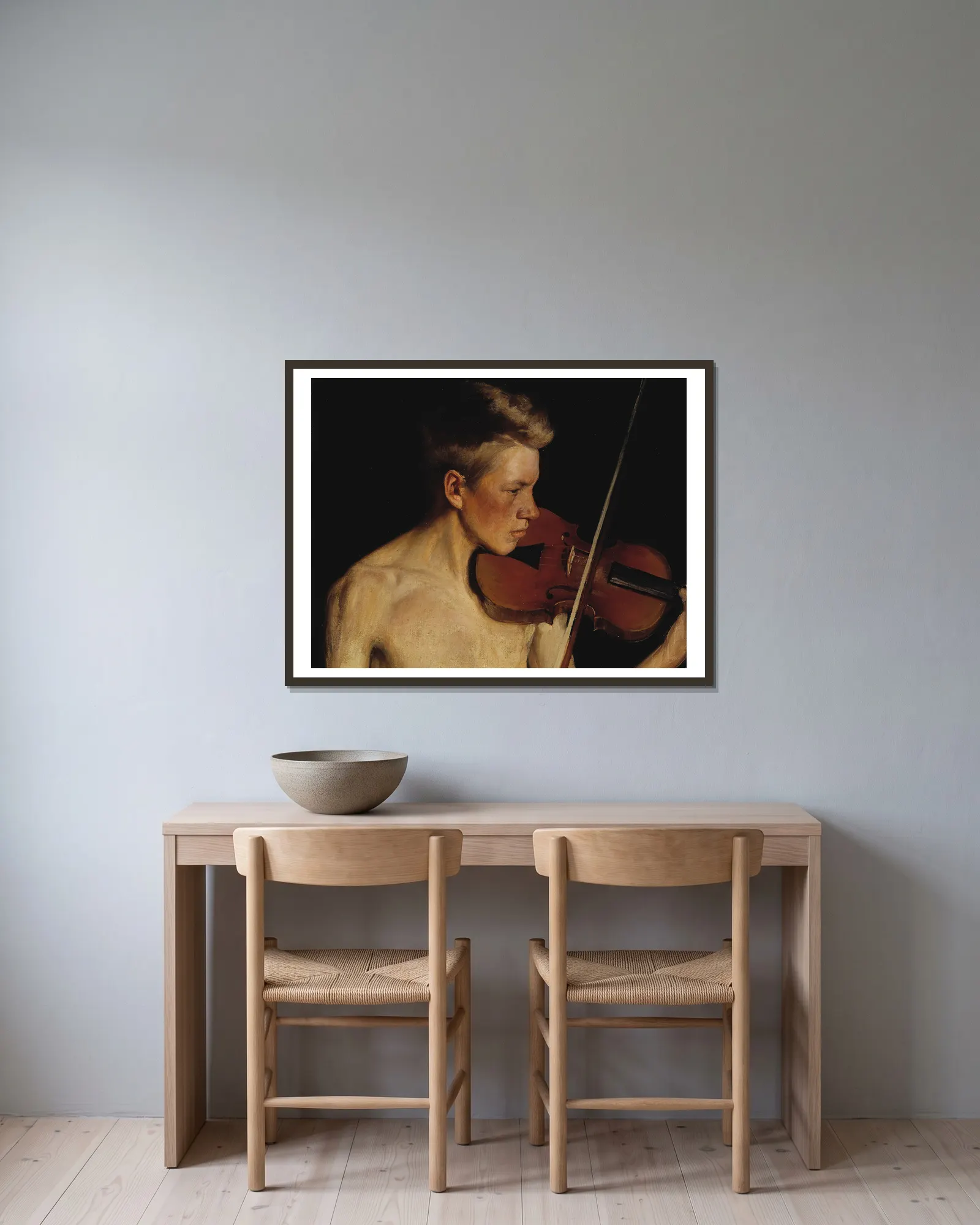 The Violinist av Pekka Halonen inramad på en vägg