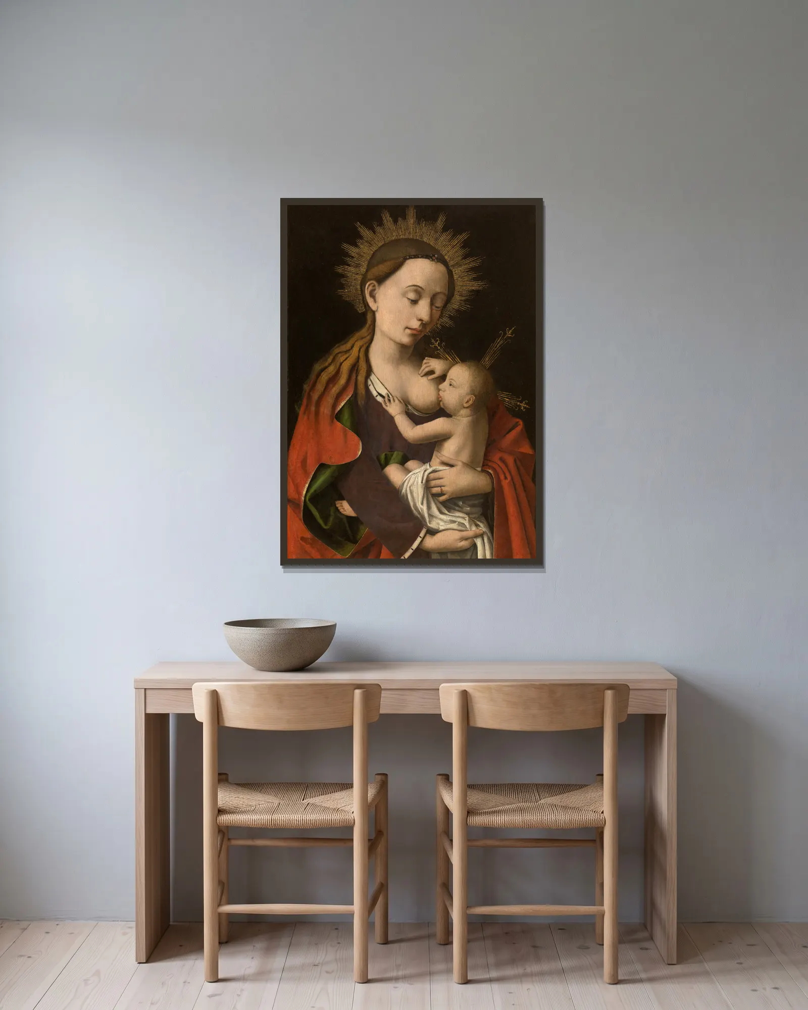 Madonna av Petrus Christus inramad på en vägg
