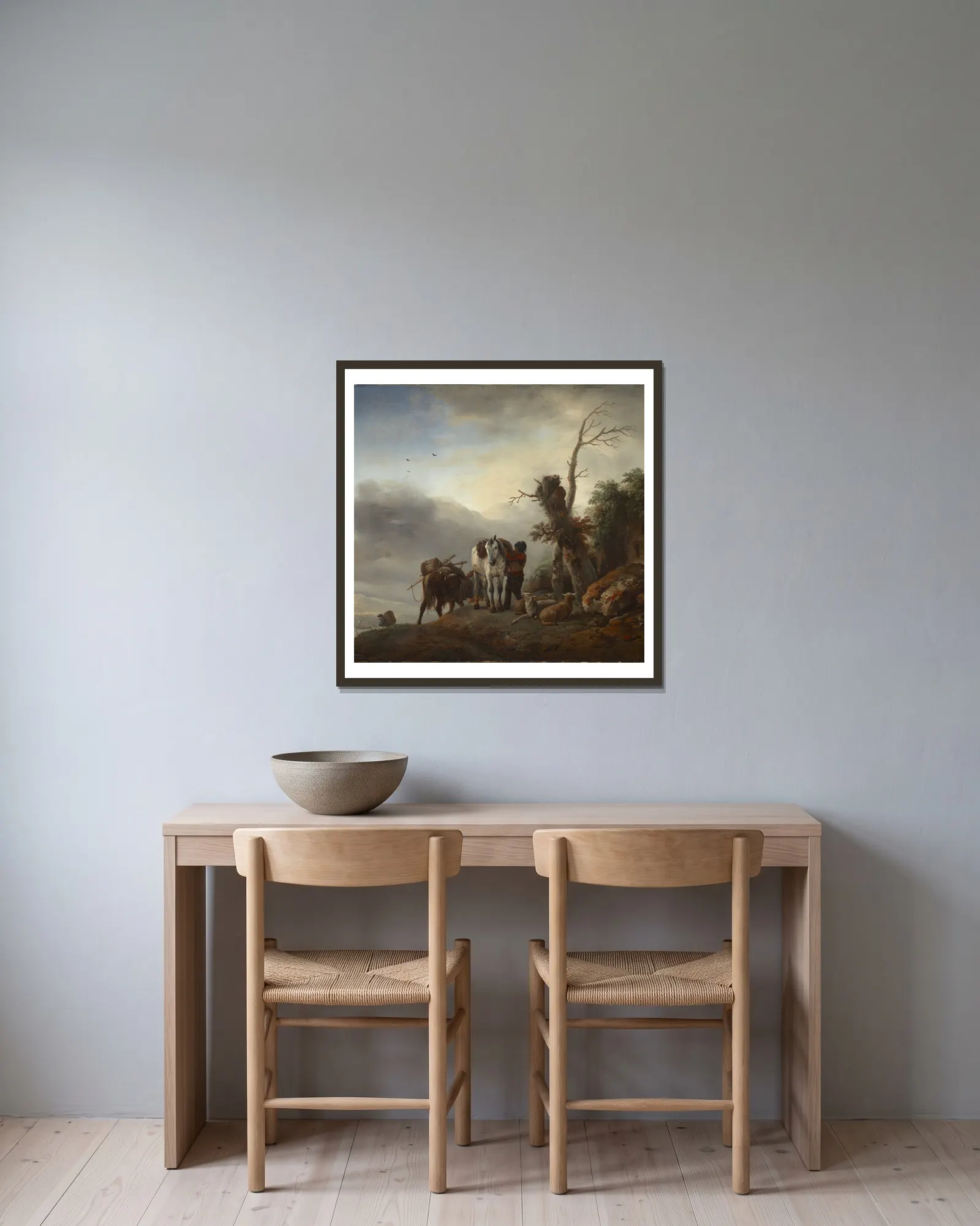 Landscape with Packhorses av Philips Wouwerman inramad på en vägg
