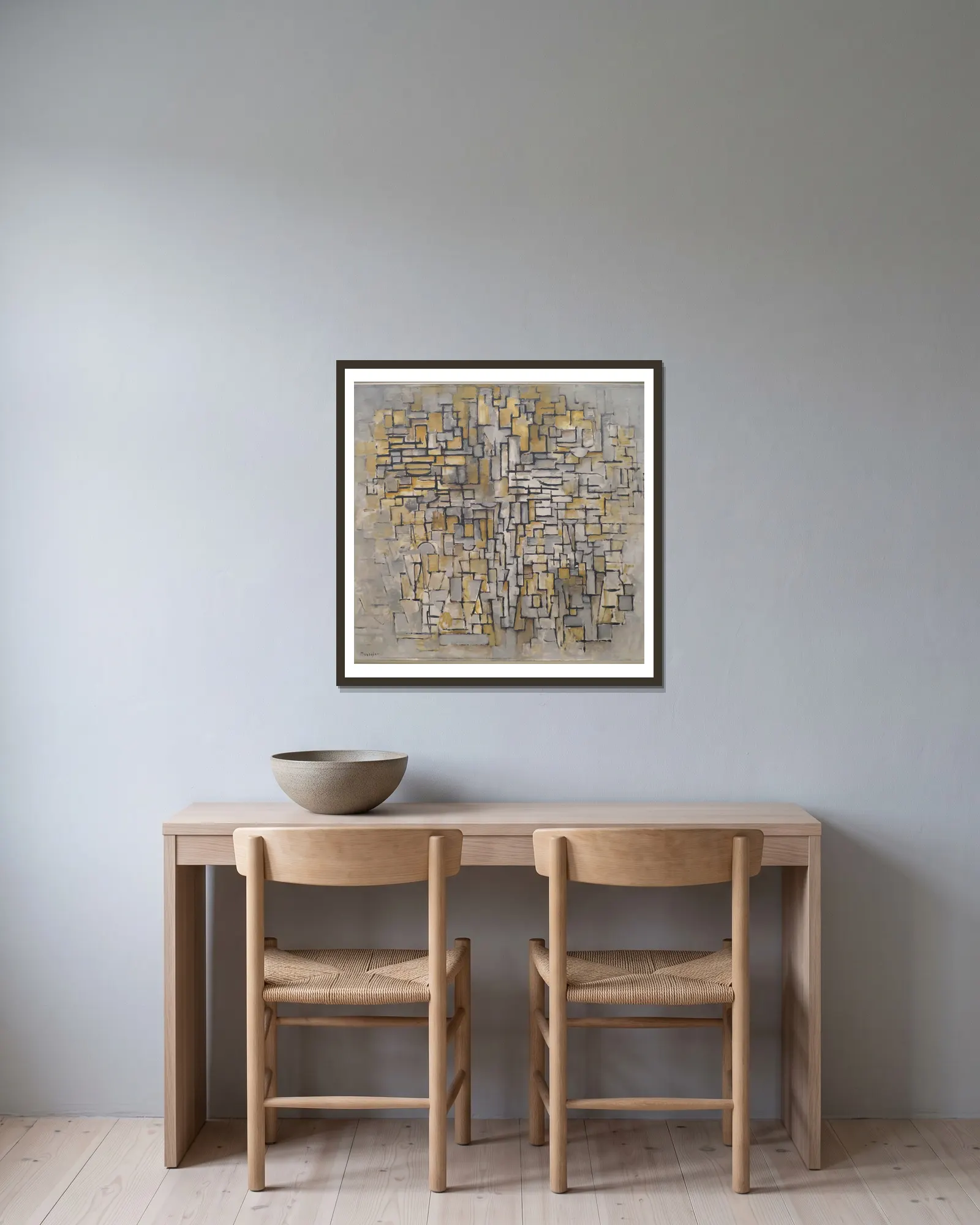 Tableau No. 2,Composition No. VII av Piet Mondrian inramad på en vägg