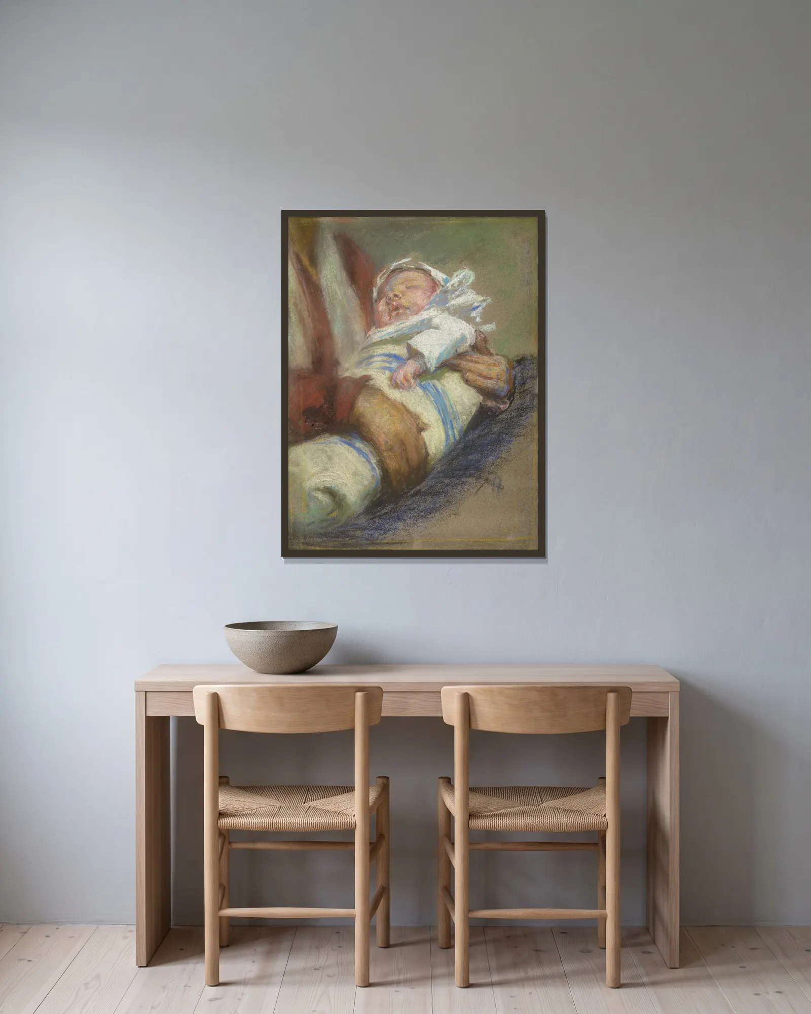 In Swaddlings av Alice Pike Barney inramad på en vägg