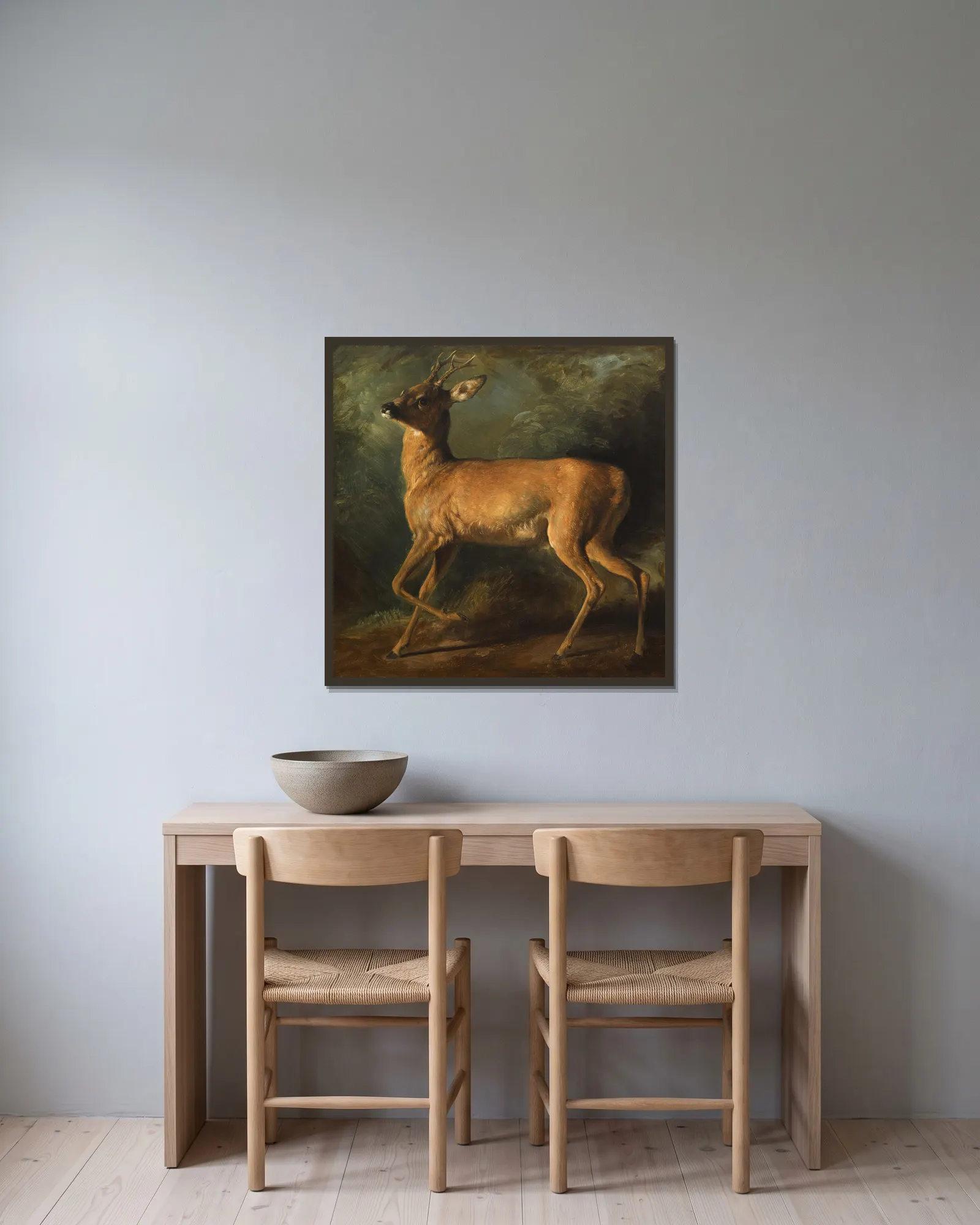 A roebuck av Raden Saleh inramad på en vägg