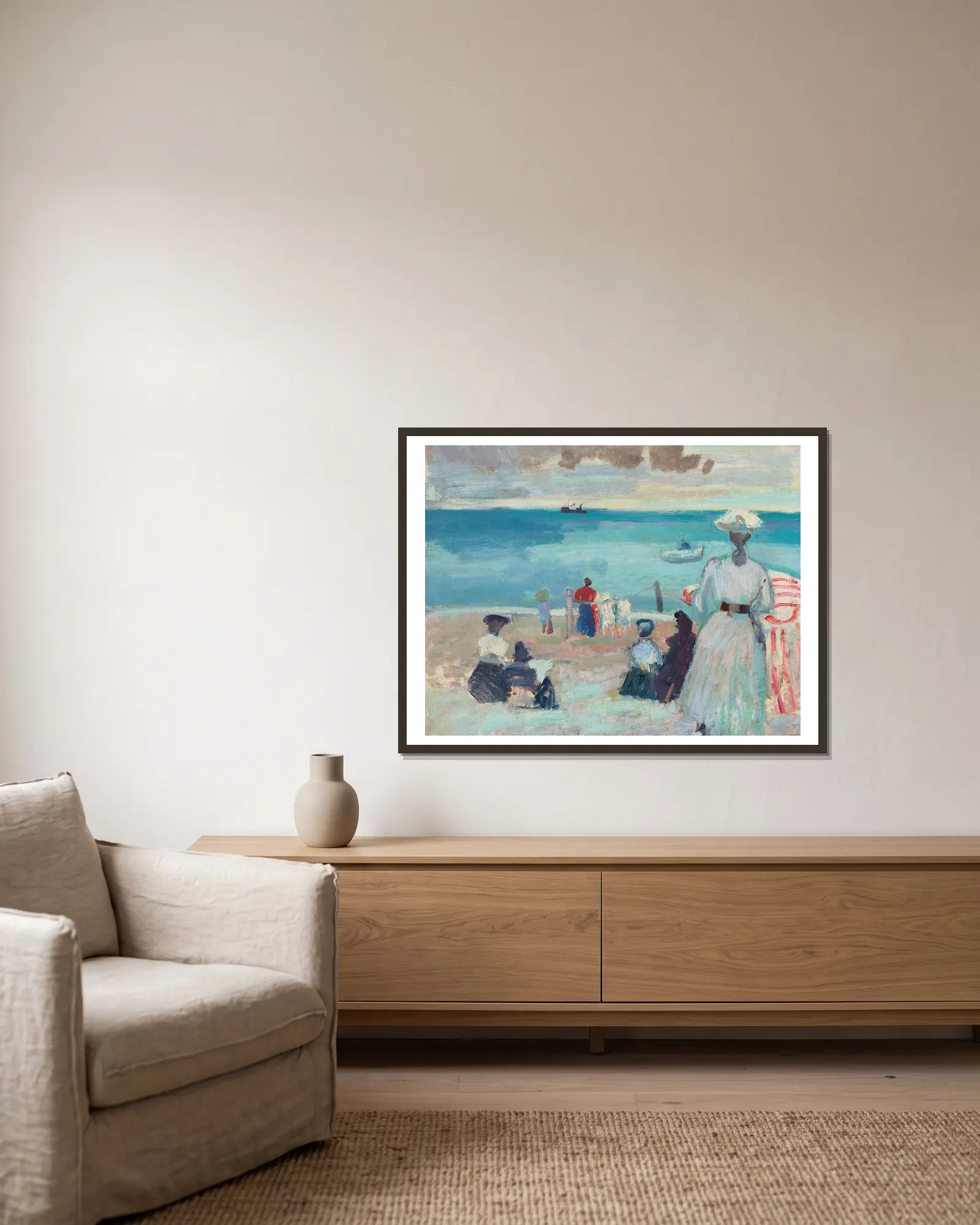 La Plage av Raoul Dufy inramad på en vägg