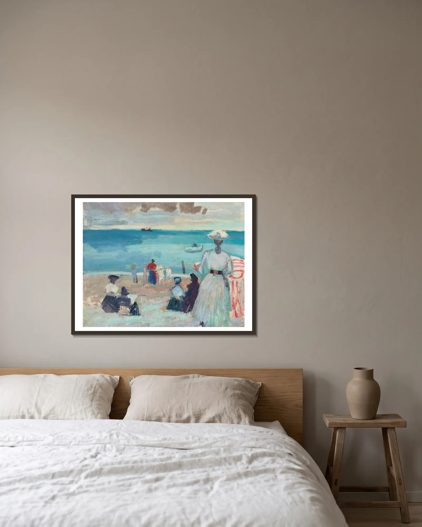 La Plage av Raoul Dufy inramad på en vägg