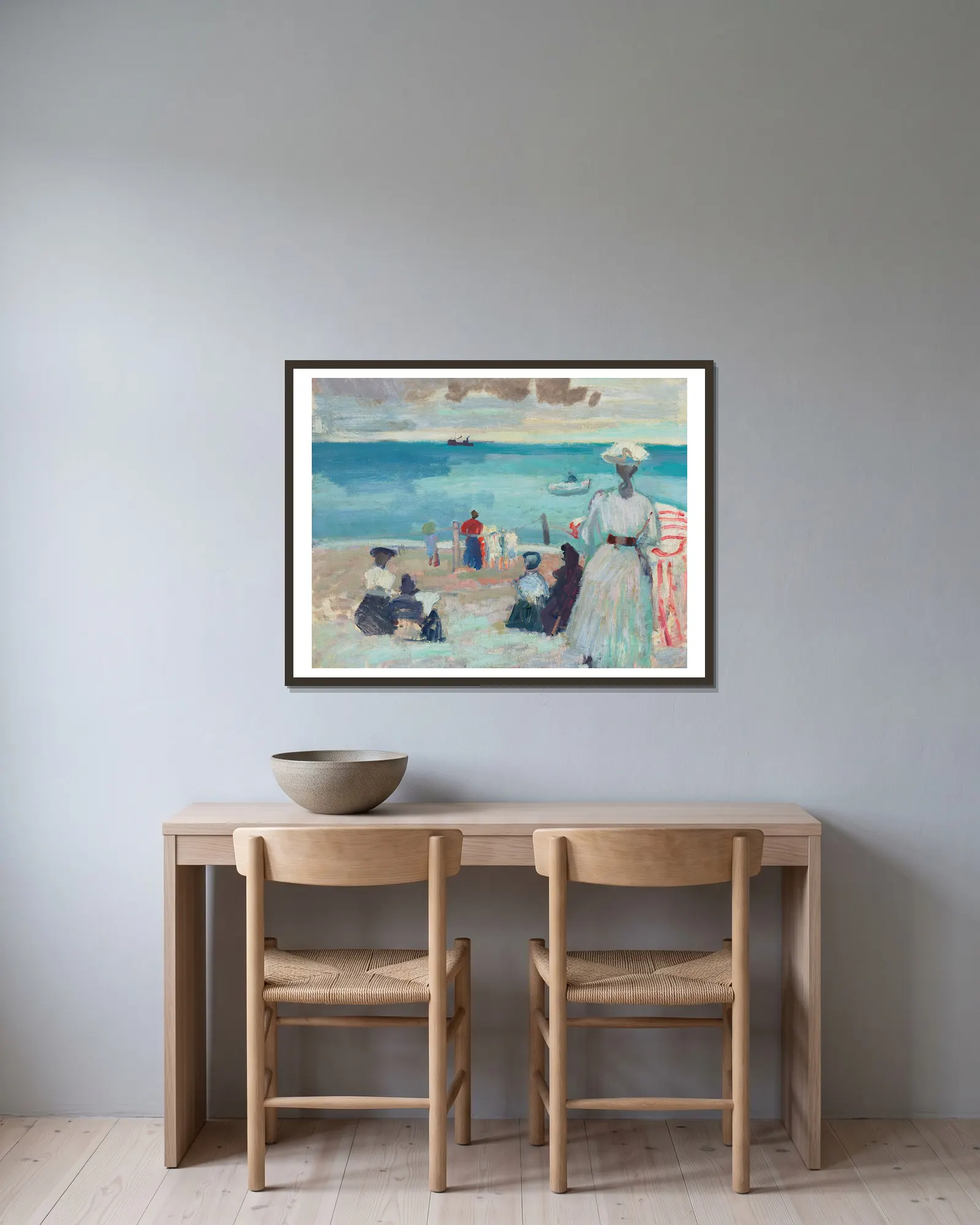 La Plage av Raoul Dufy inramad på en vägg
