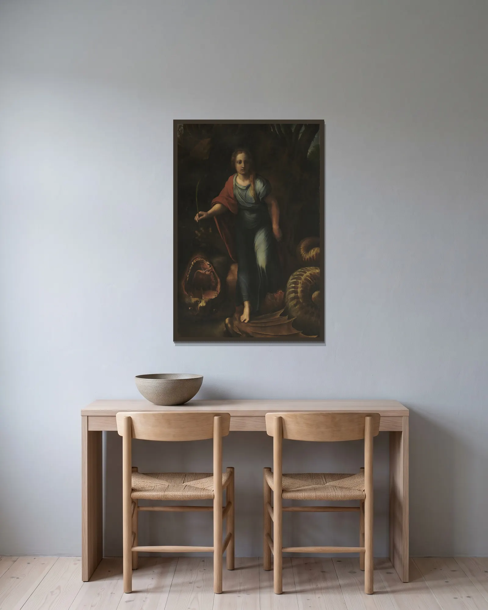 Saint Margaret av Raphael inramad på en vägg