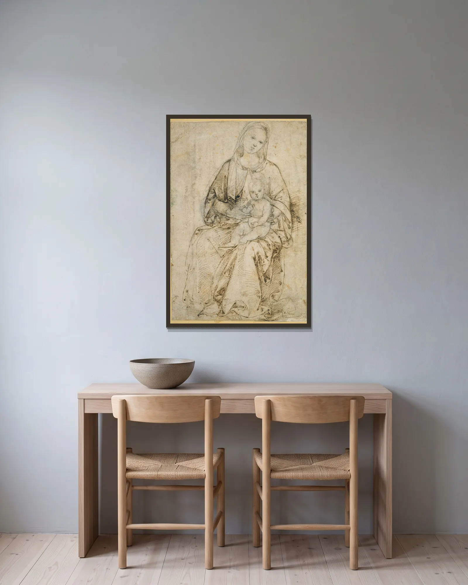 Seated Madonna and Child av Raphael inramad på en vägg