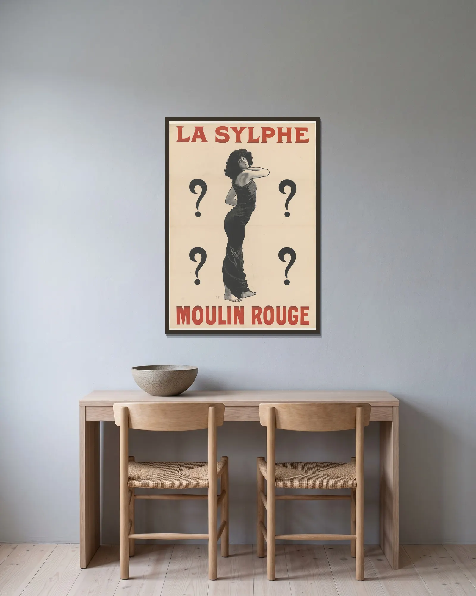 La Sylphe av René Péan inramad på en vägg