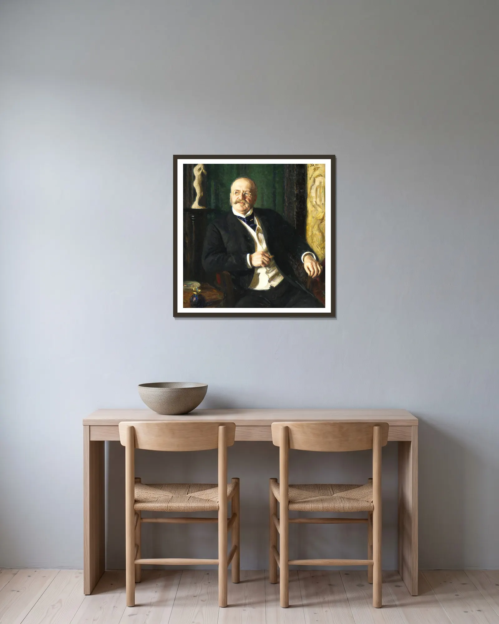 Julius Caspar, Merchant av Richard Bergh inramad på en vägg