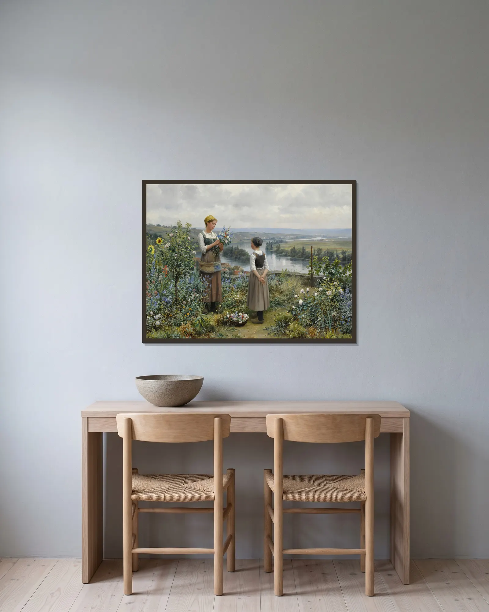 Picking Flowers av Daniel Ridgway Knight inramad på en vägg