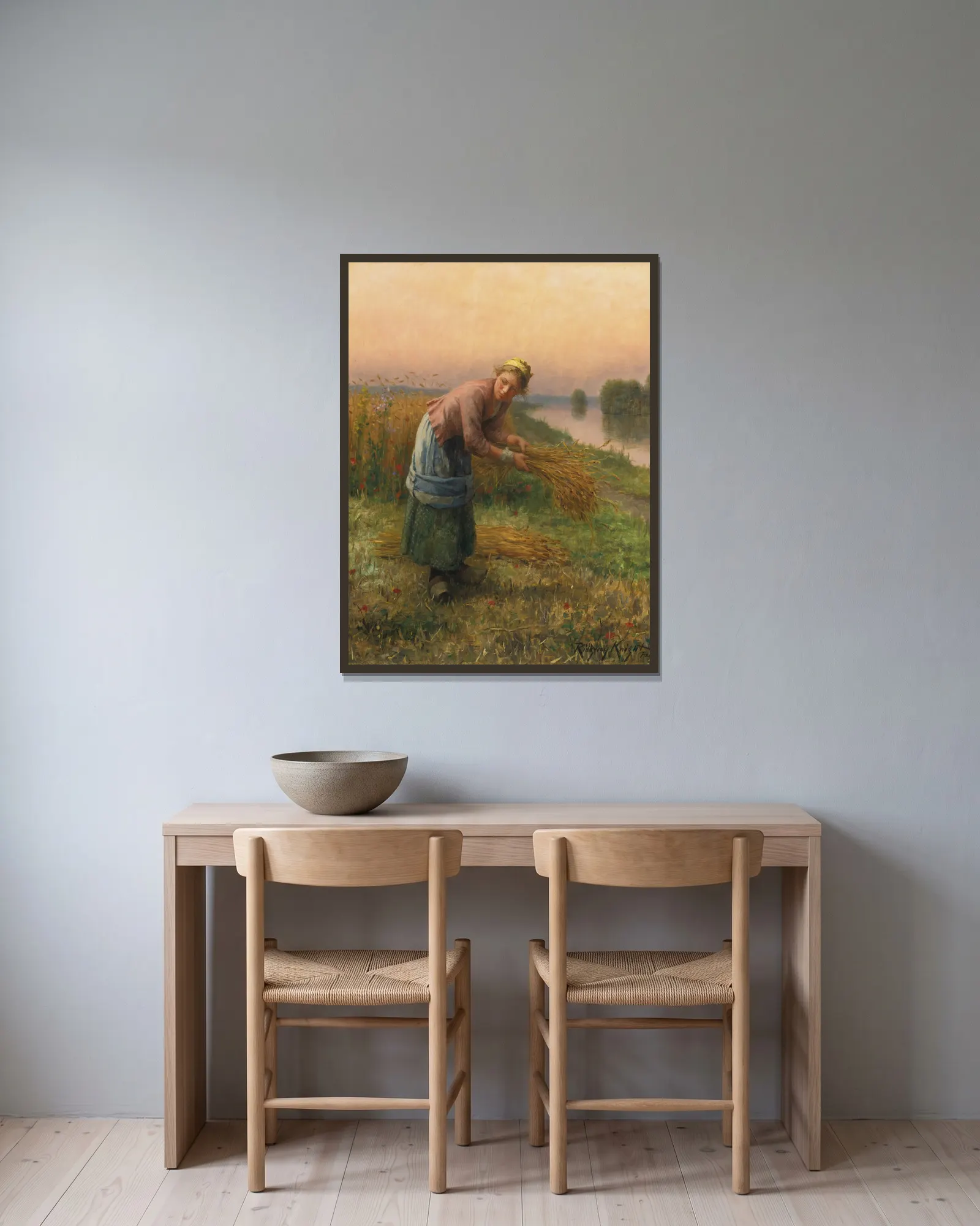 The Gleaner av Daniel Ridgway Knight inramad på en vägg
