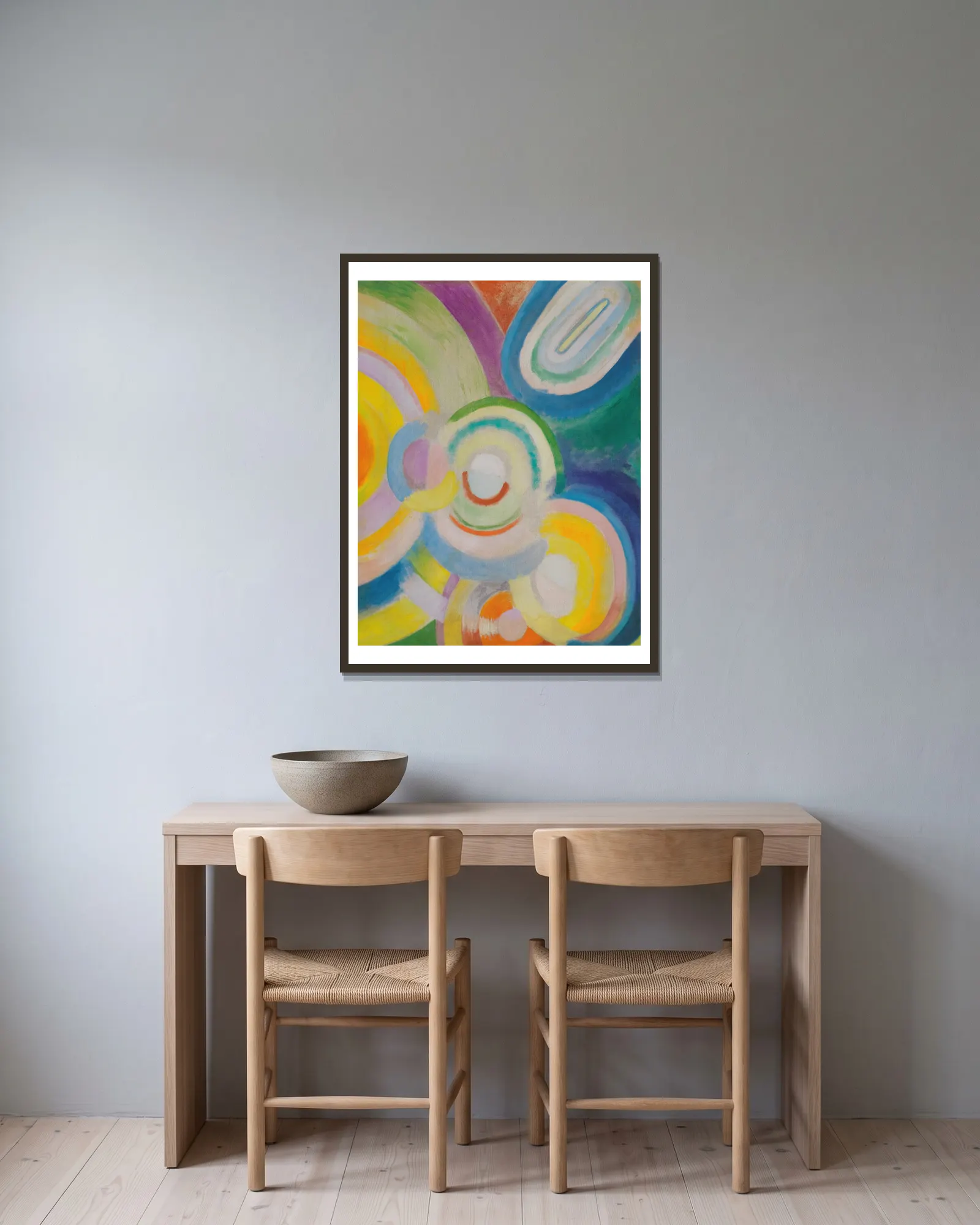 Disques Colorés av Robert Delaunay inramad på en vägg